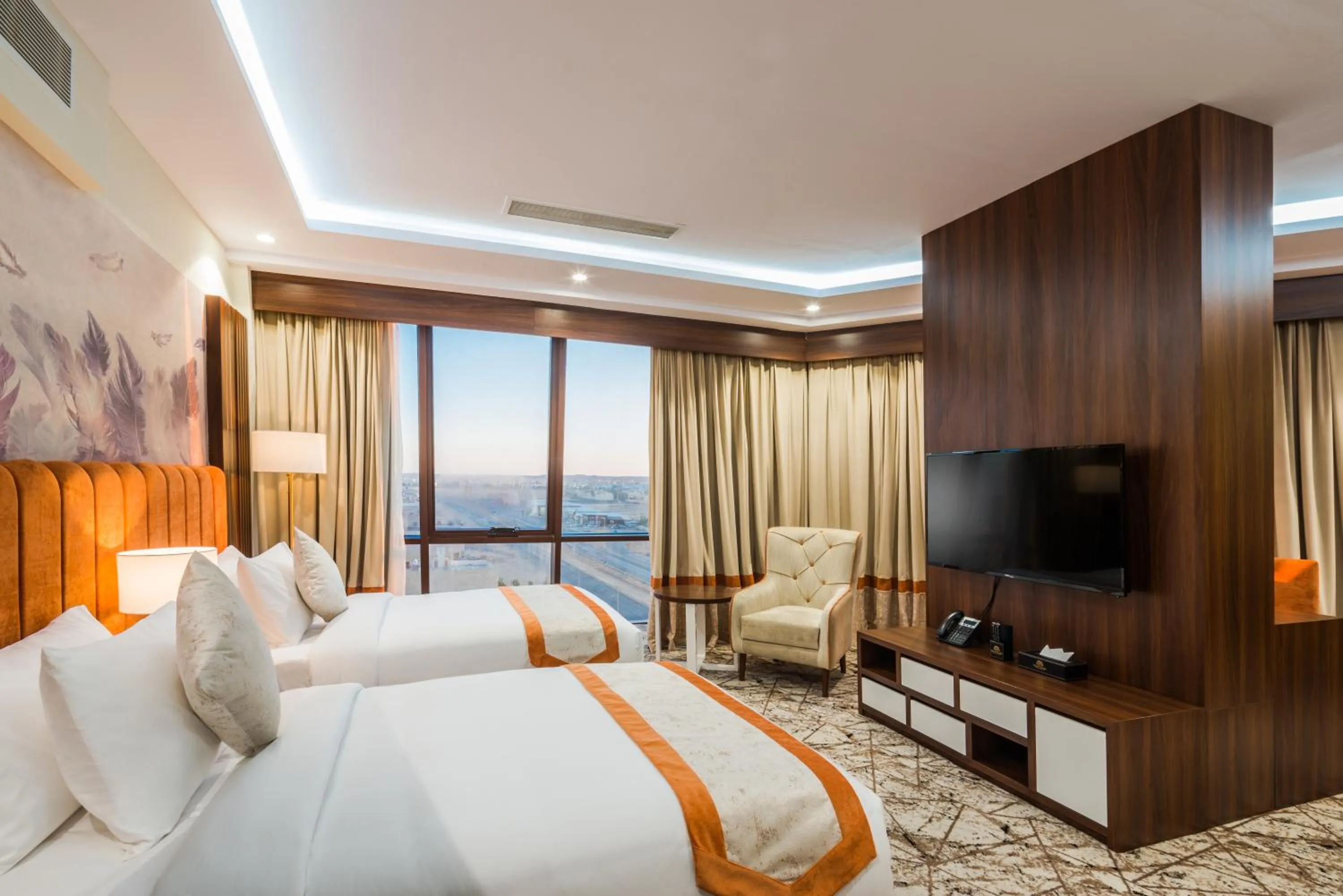 Bed in Tulip Plaza Hotel