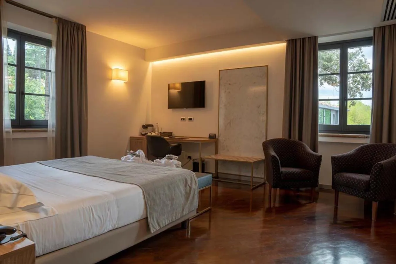 Bed in Le Cappuccinelle Suites&SPA