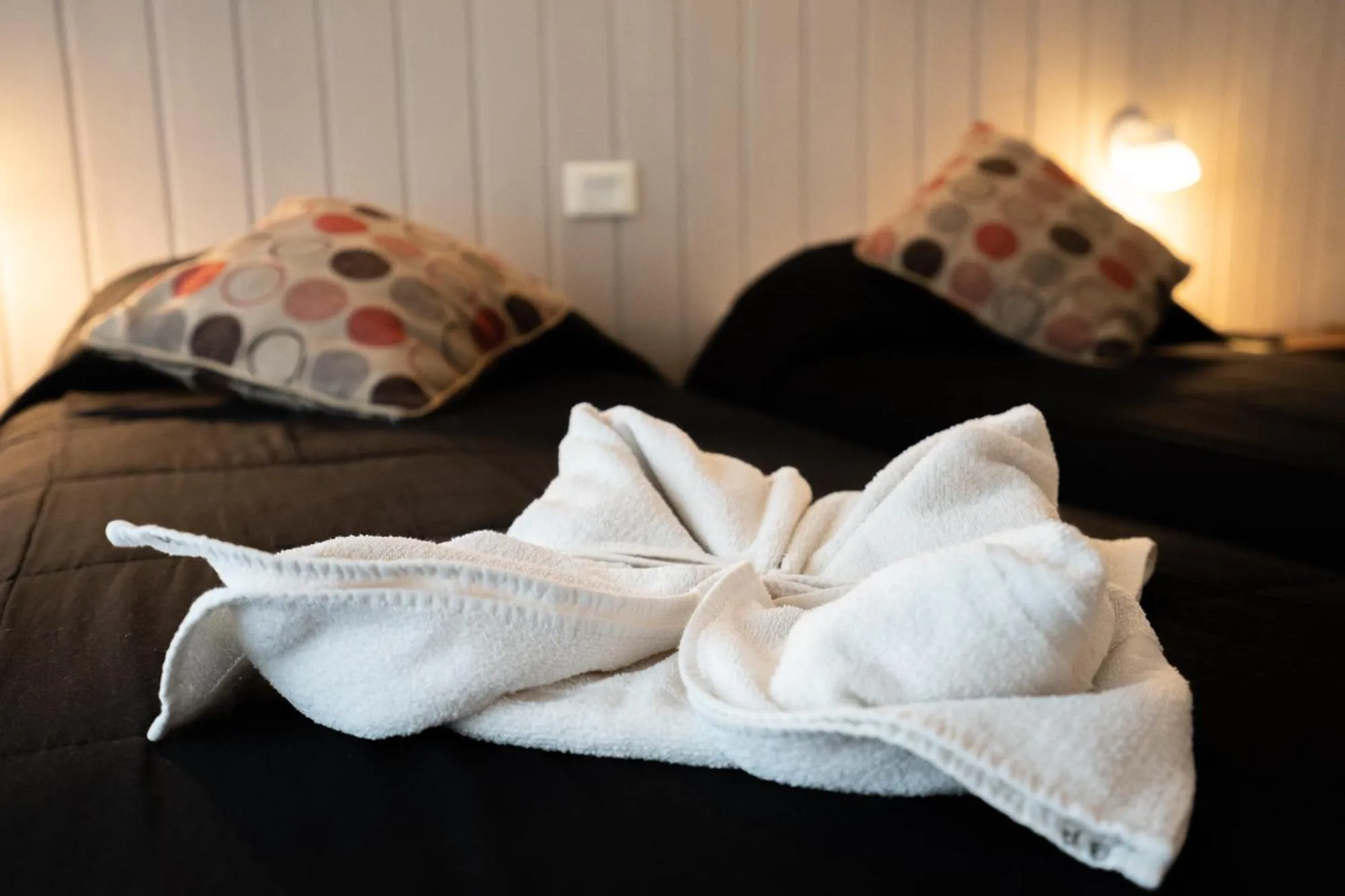 Bed in Tangoinn Club Hotel