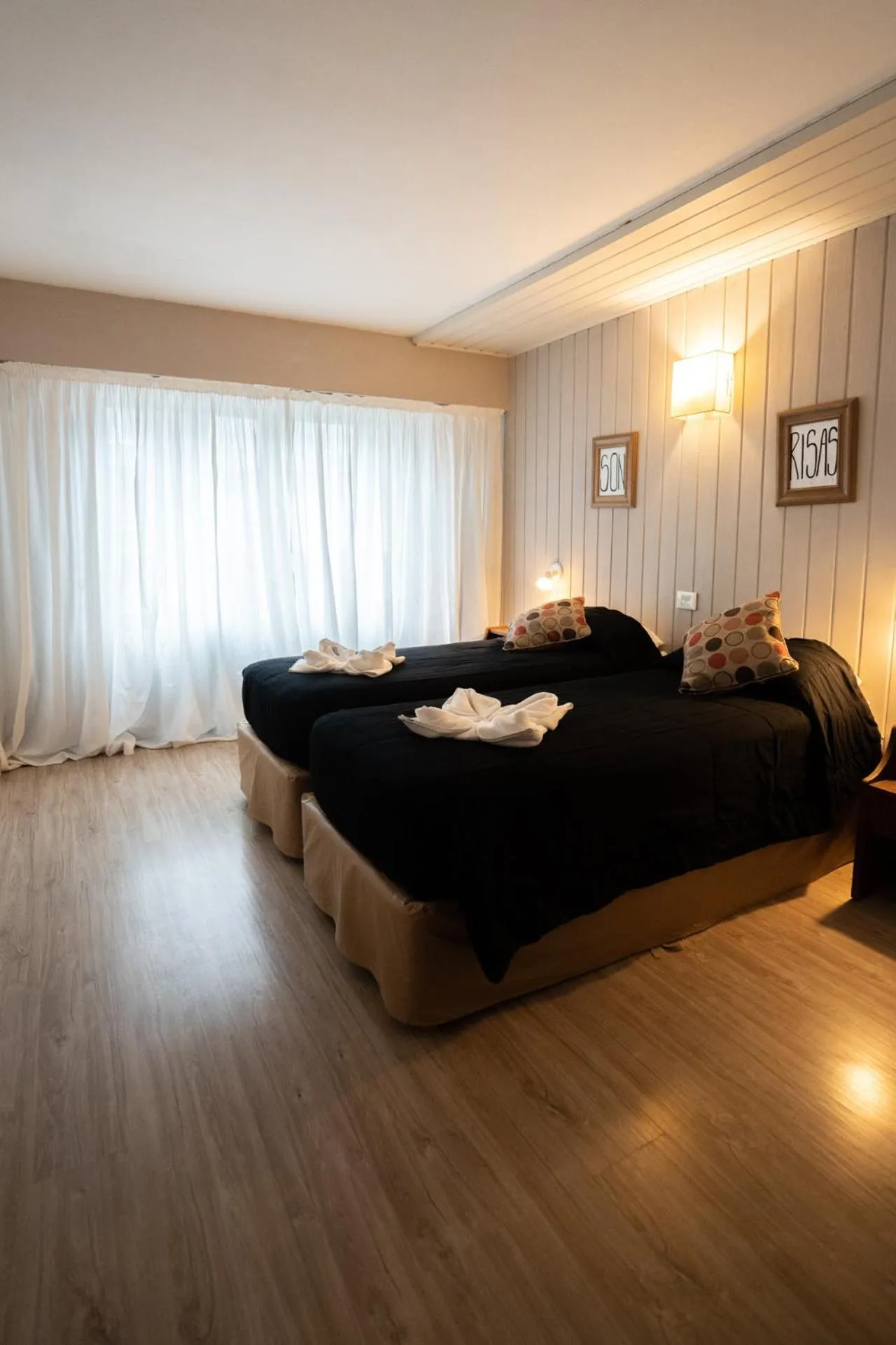 Bed in Tangoinn Club Hotel