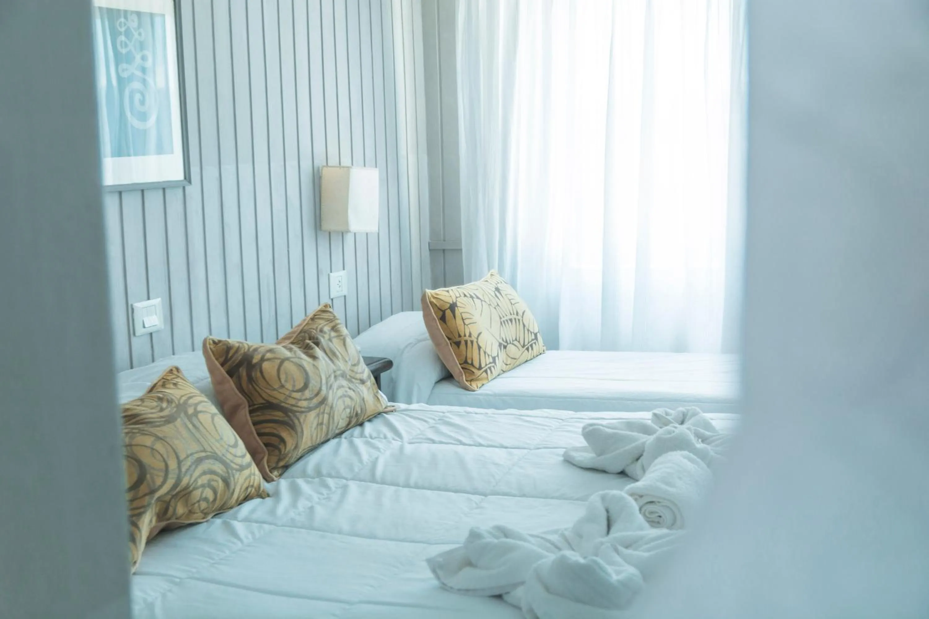 Bed in Tangoinn Club Hotel