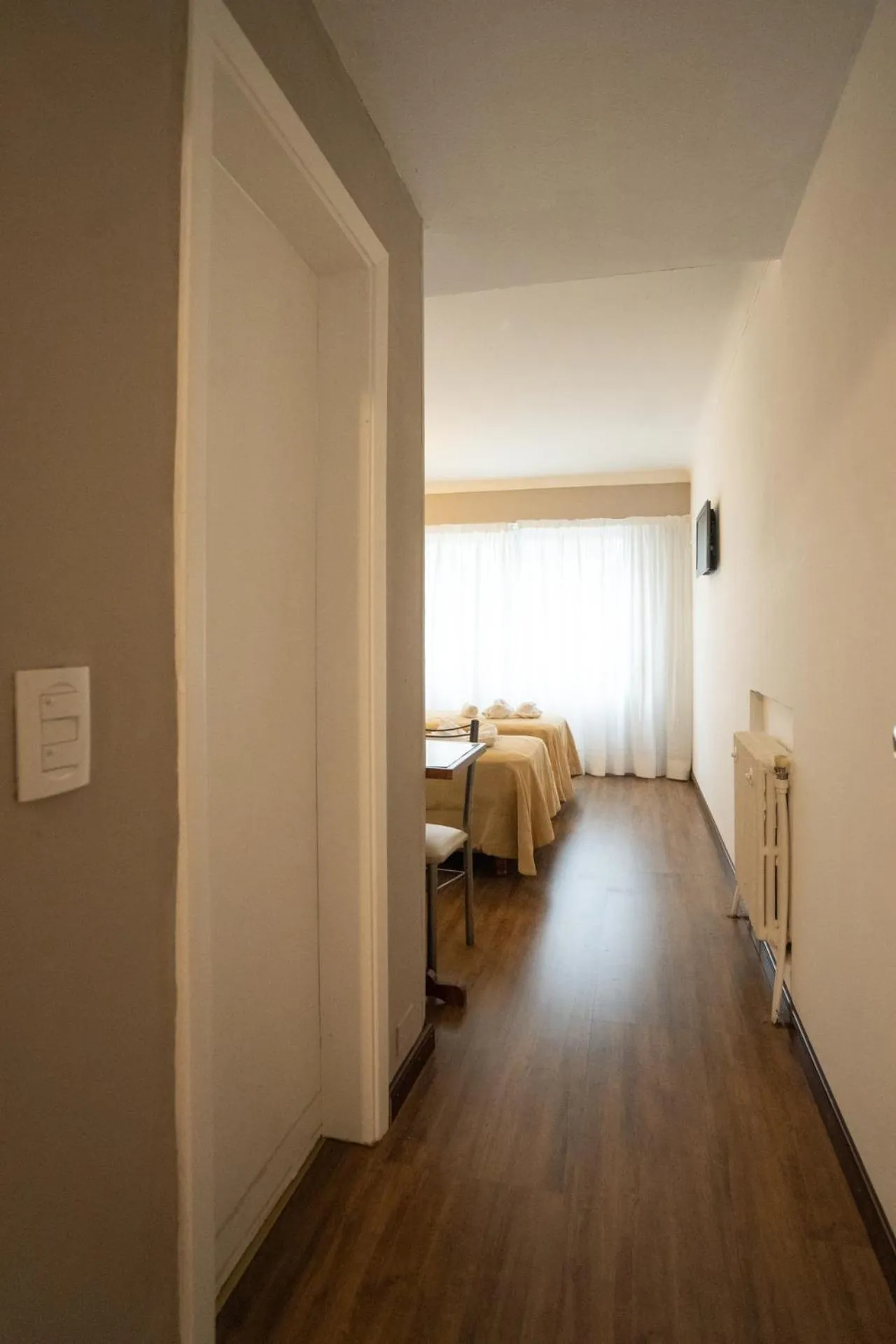 Bed in Tangoinn Club Hotel