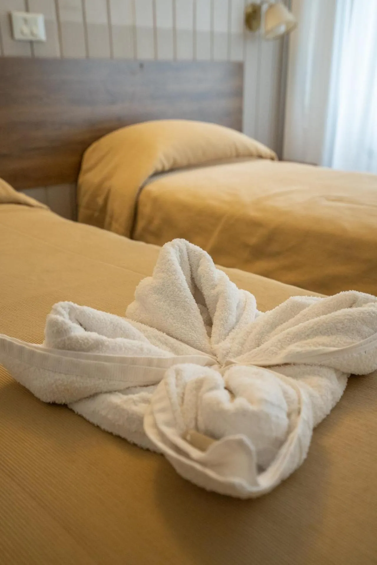 Bed in Tangoinn Club Hotel