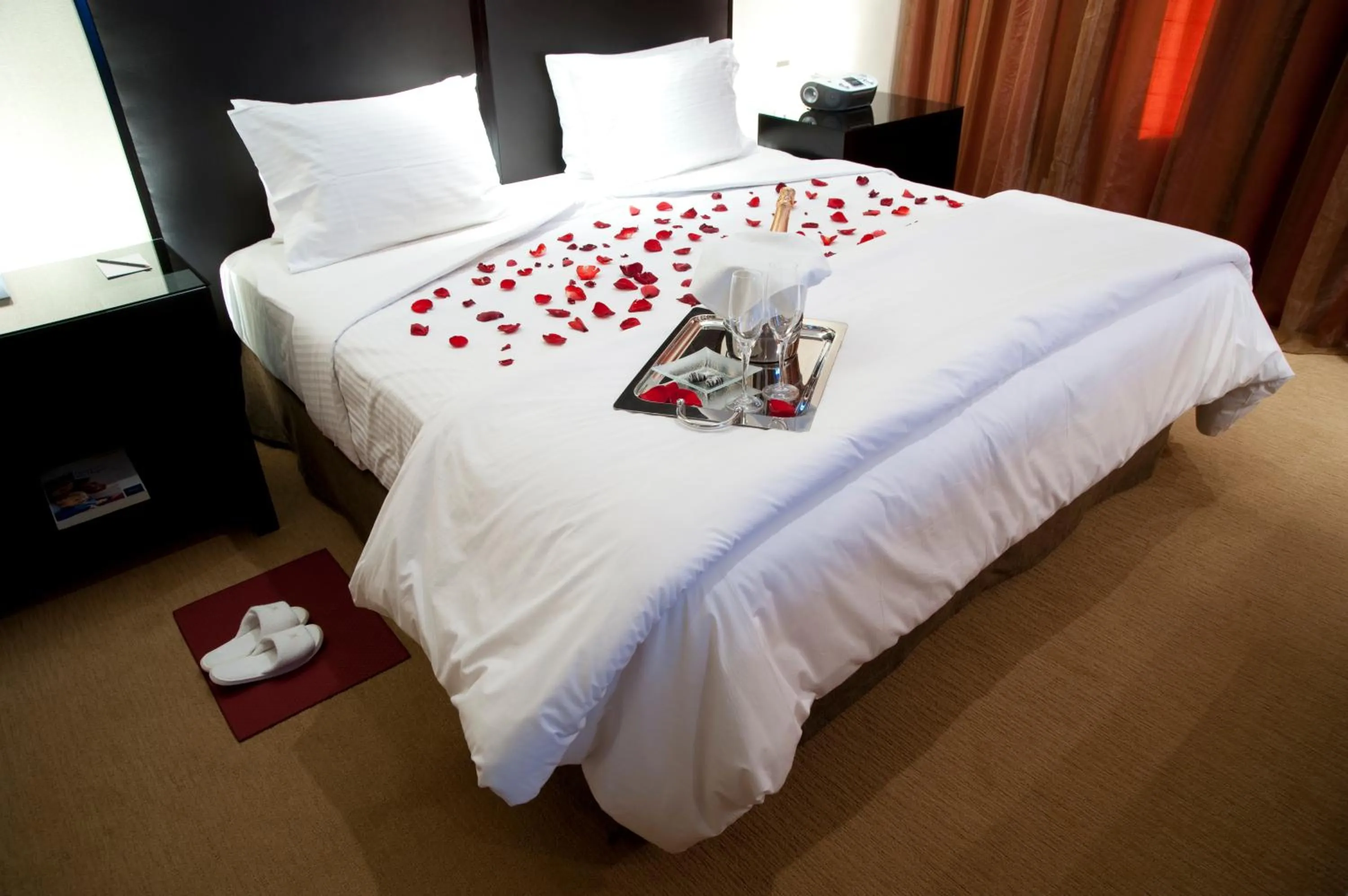 Bed in Hotel Casino Magic