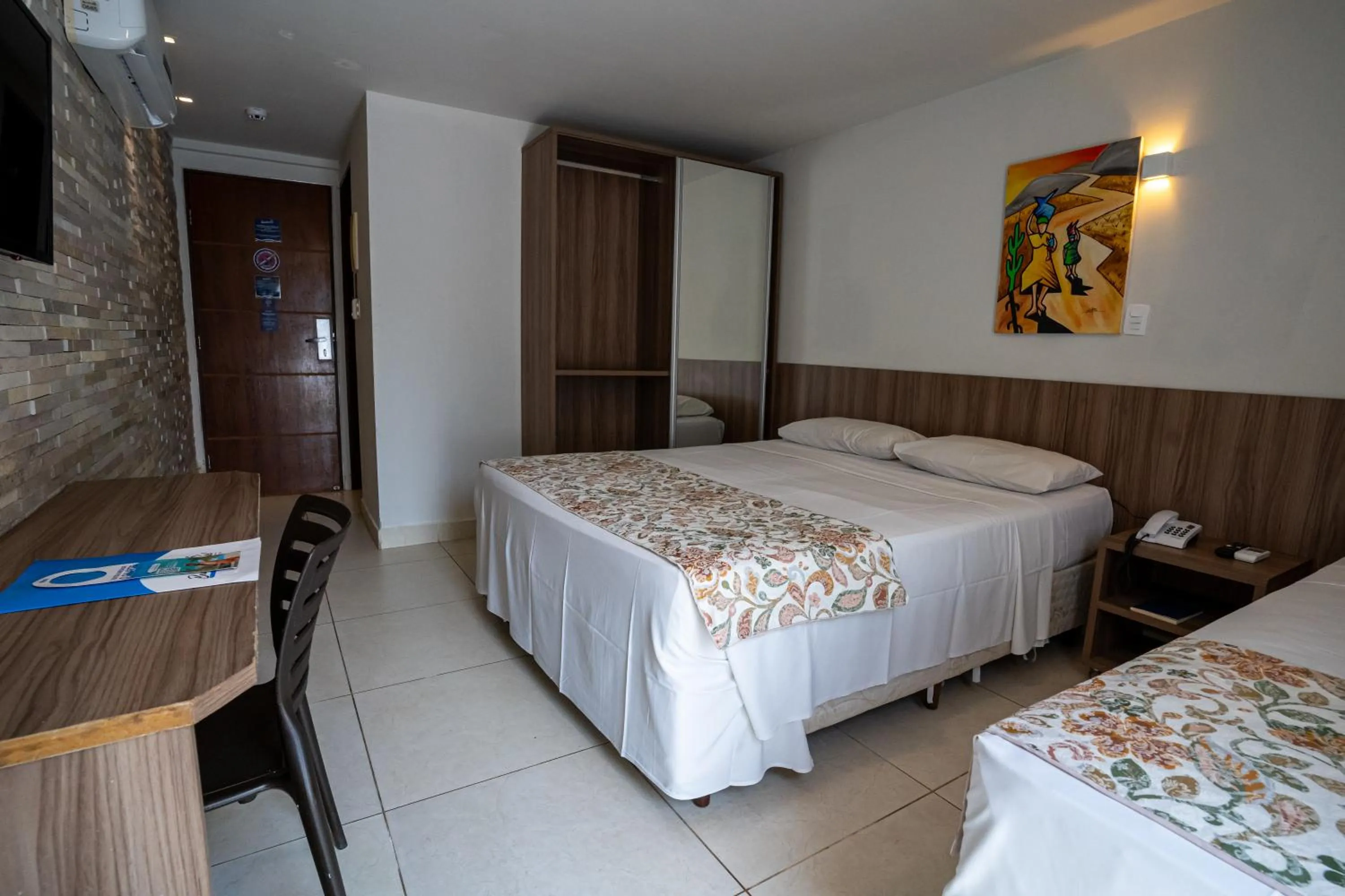 Bed in Bessa Beach Hotel