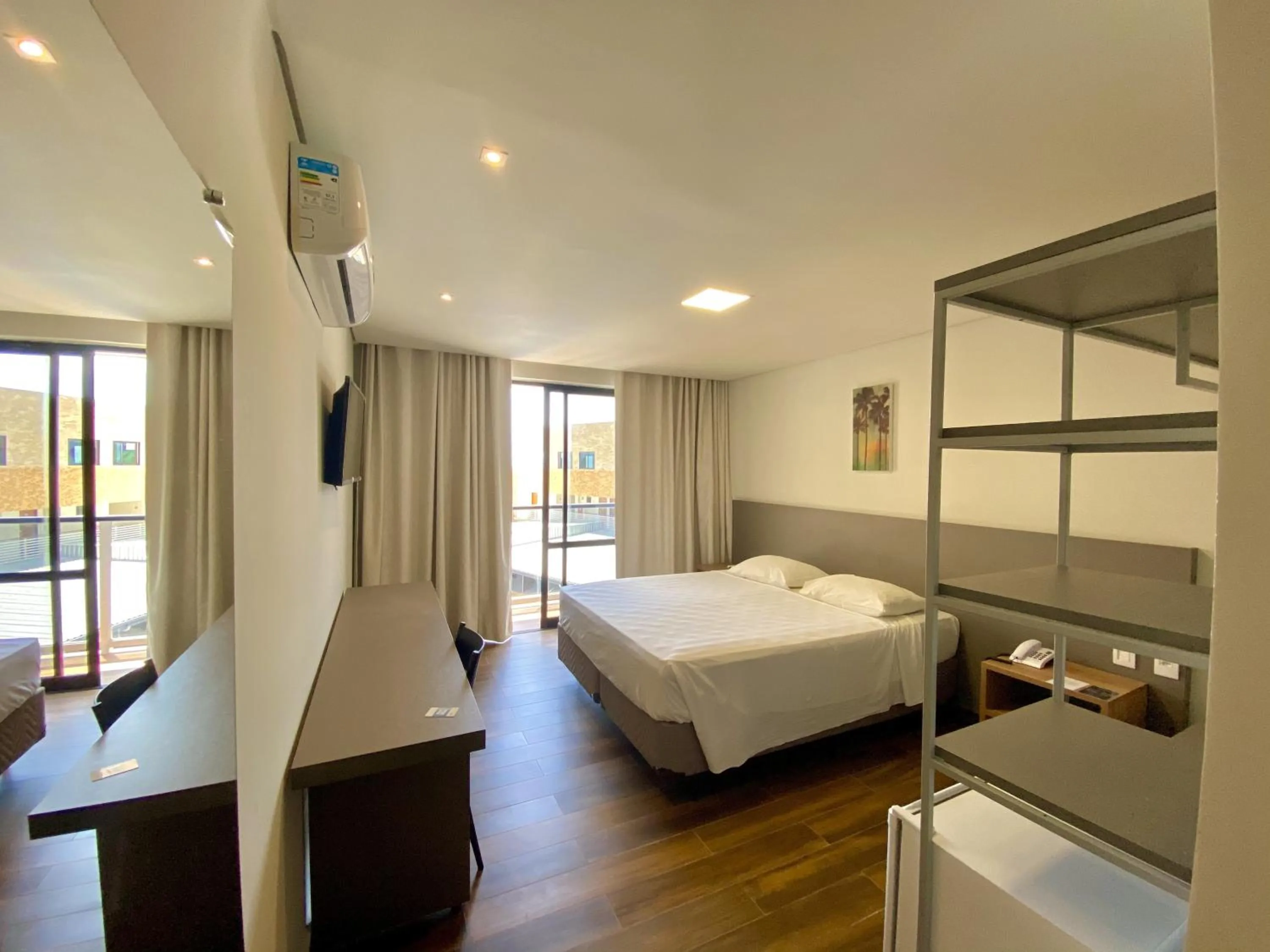 Bed in Bessa Beach Hotel