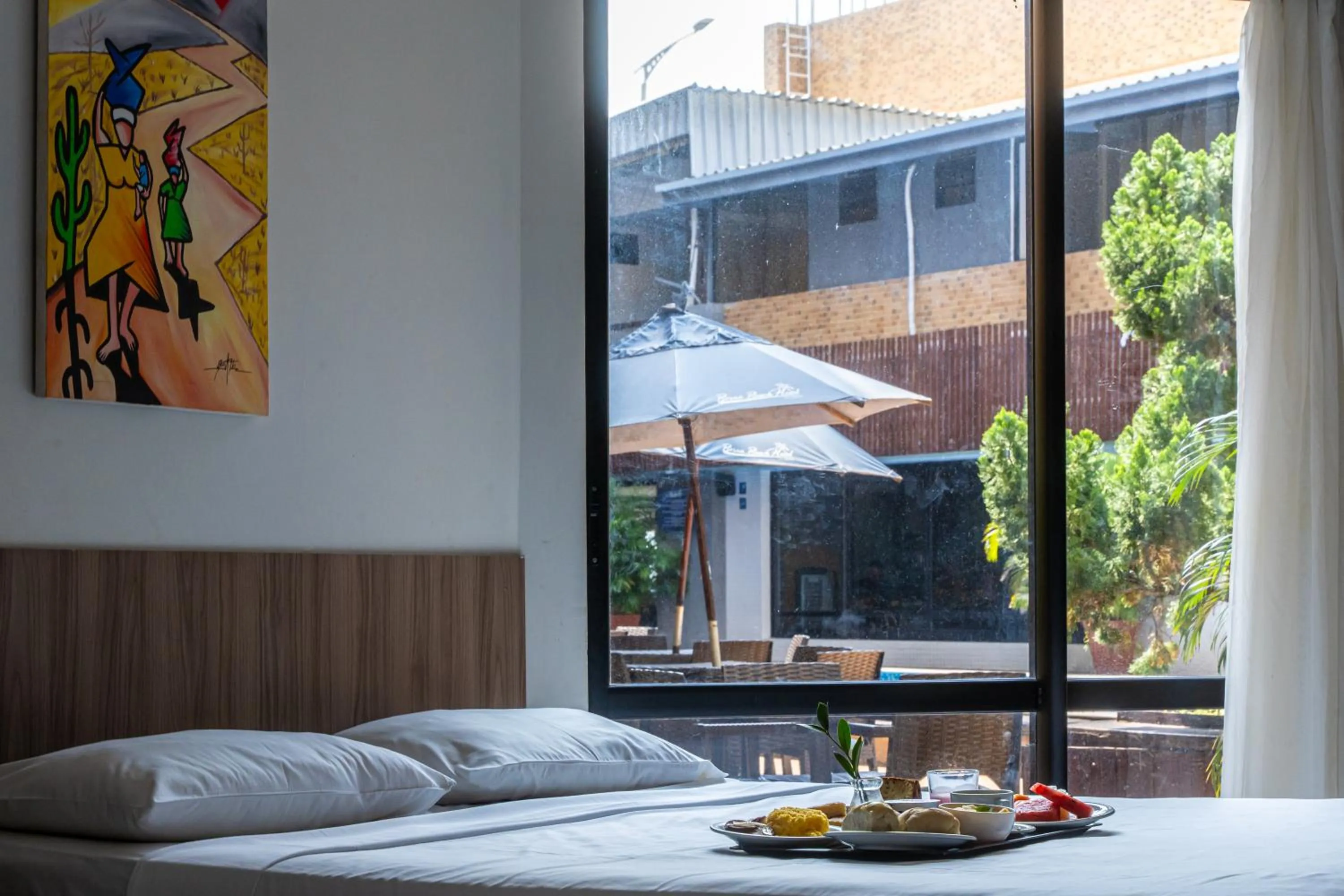 Bed in Bessa Beach Hotel