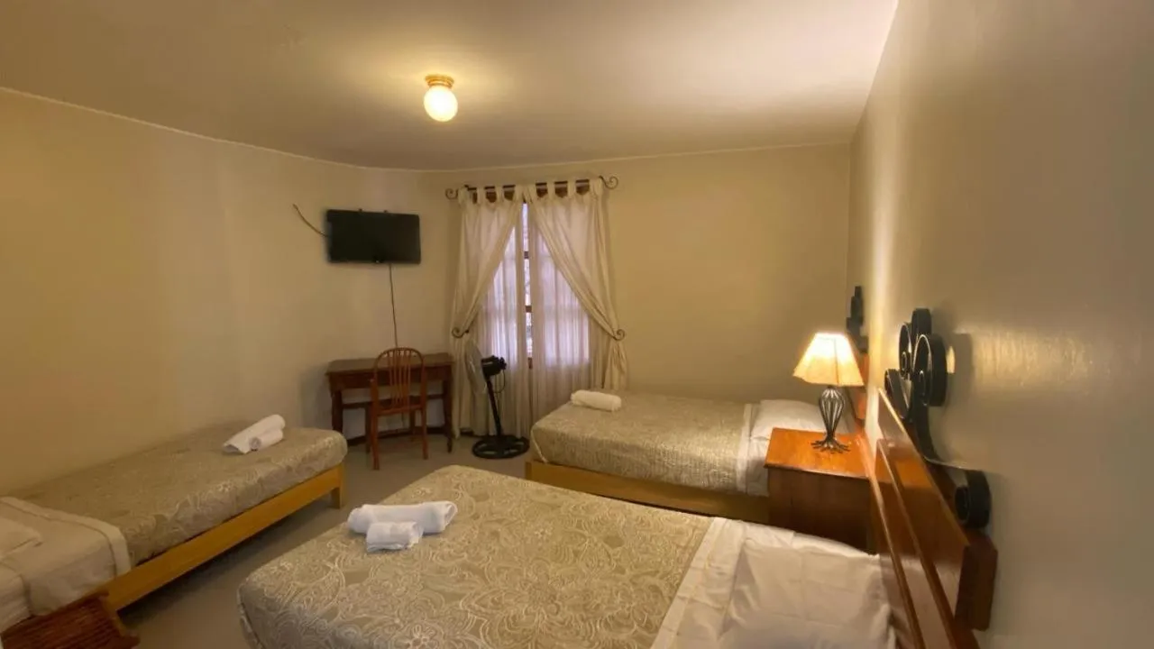 Bed in Hosteria Suiza