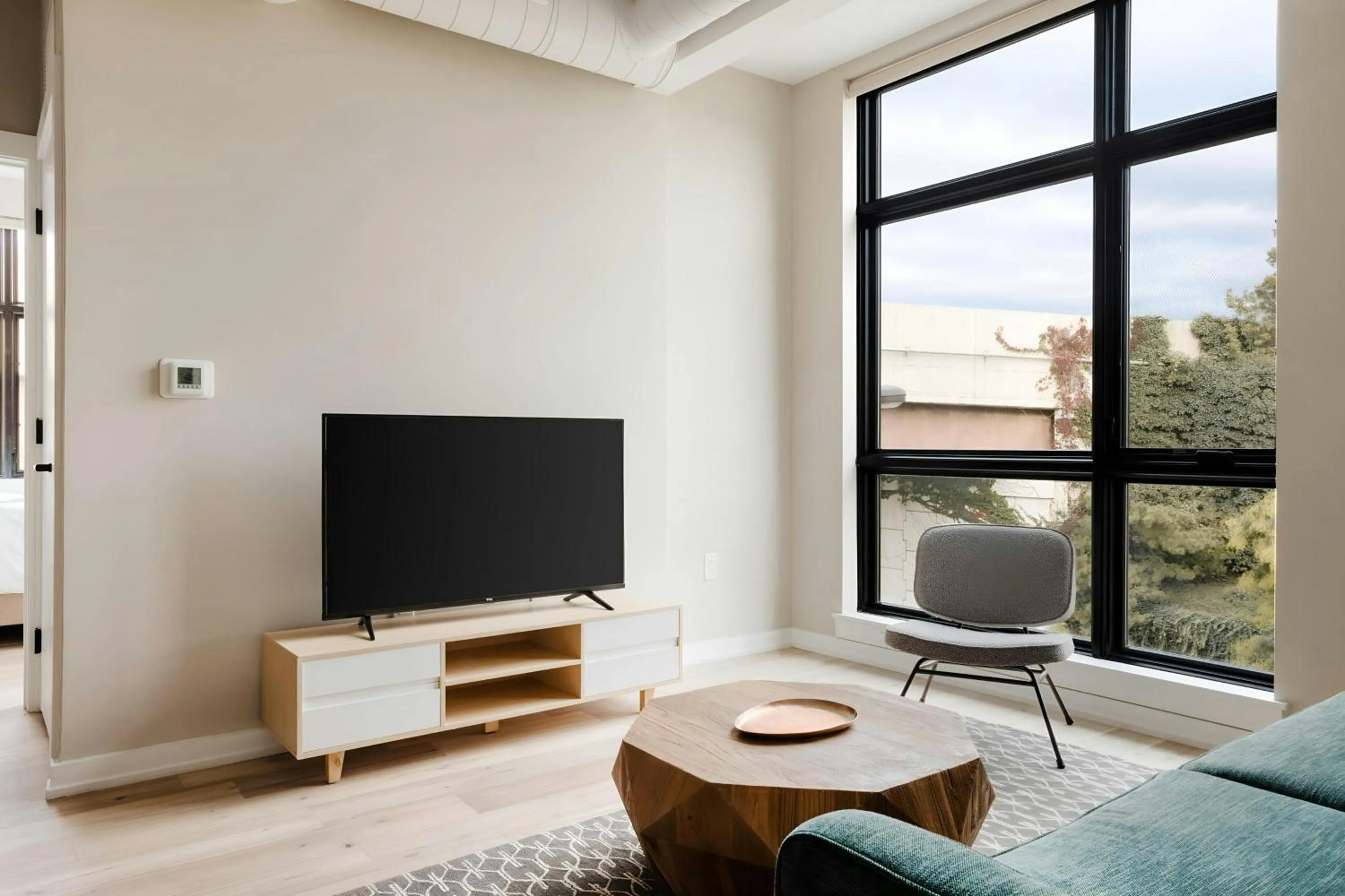 Living room in Sonder by Marriott Bonvoy The Edison Apartments Old City