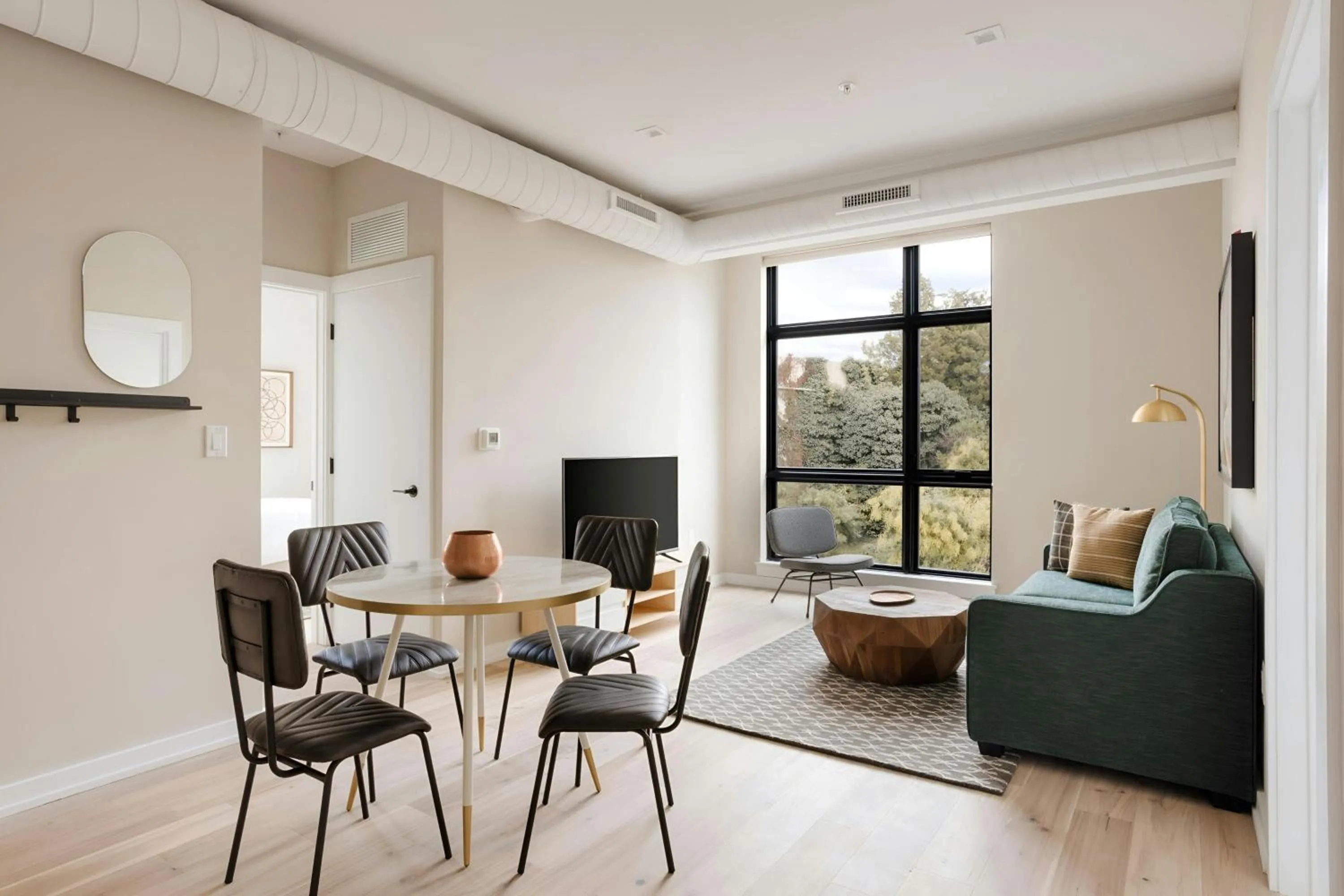 Living room in Sonder by Marriott Bonvoy The Edison Apartments Old City