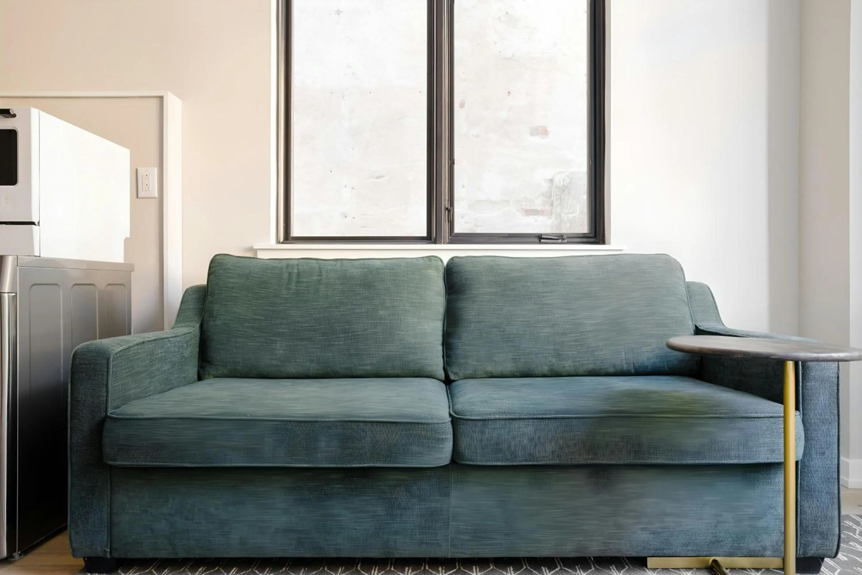 Living room in Sonder by Marriott Bonvoy The Edison Apartments Old City