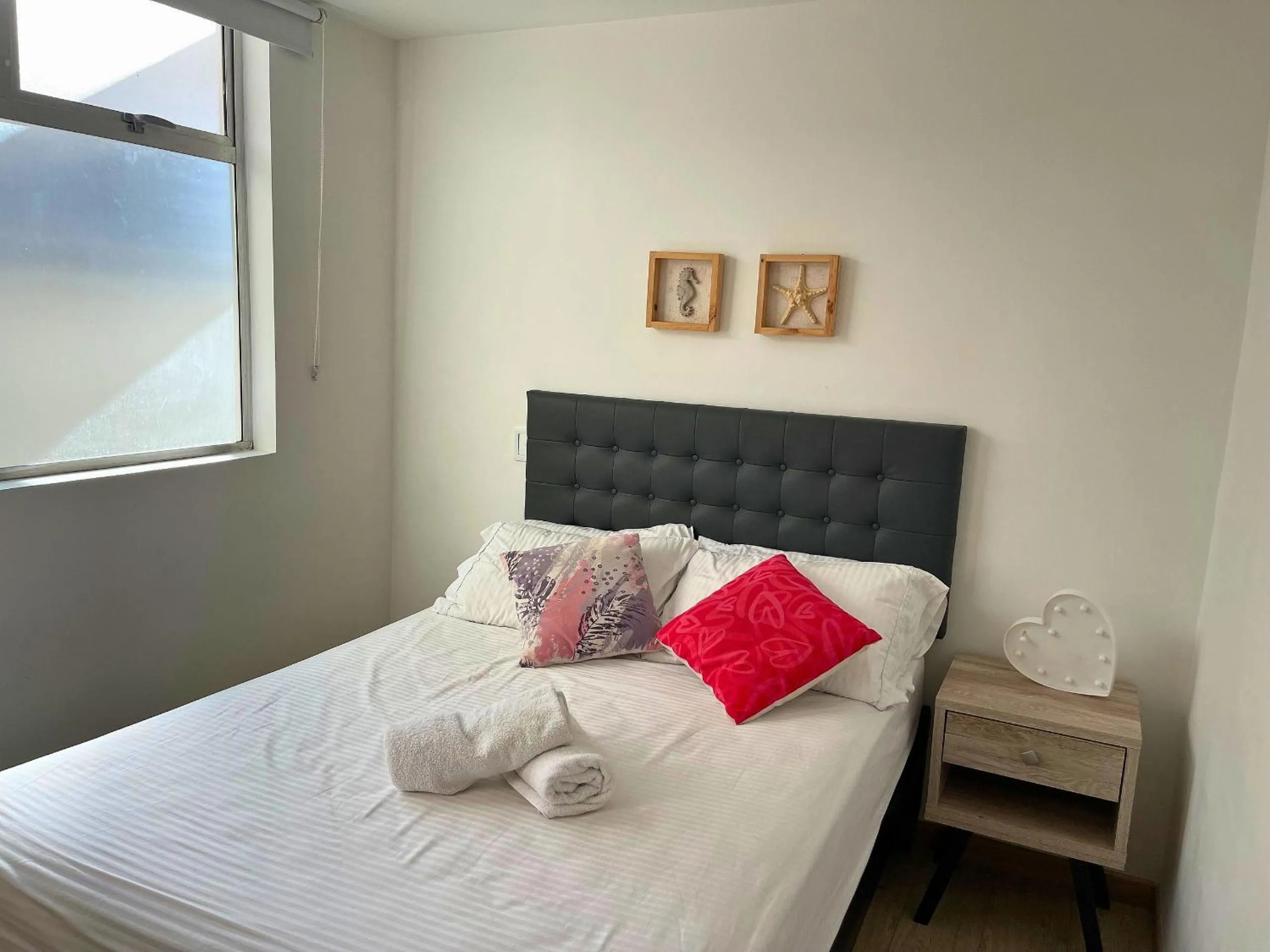 Photo of the whole room, Bed in Apartamentos Avenida del malecón, frente al lago. Guatape