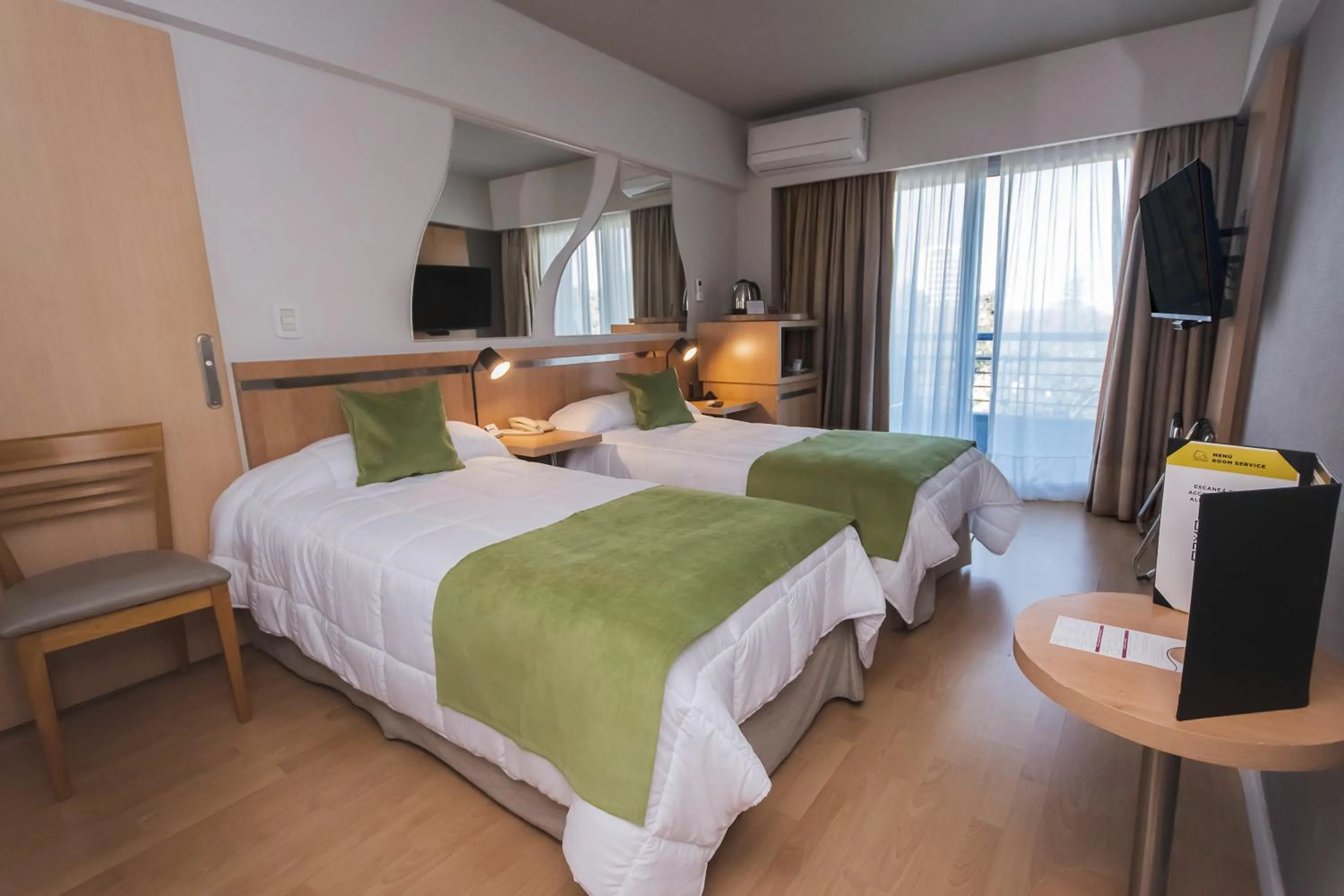 Bed in Maran Suites & Towers