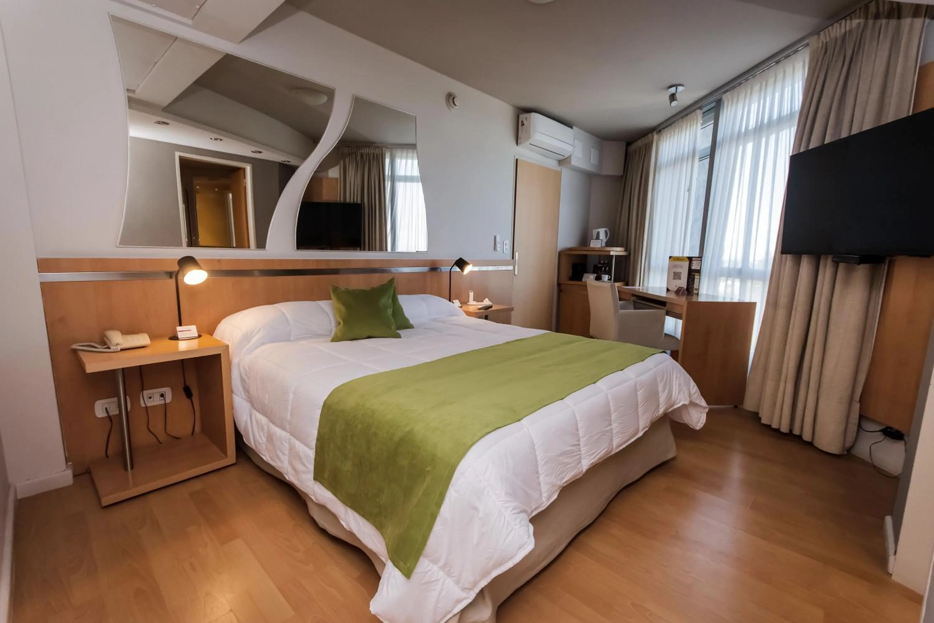 Bed in Maran Suites & Towers