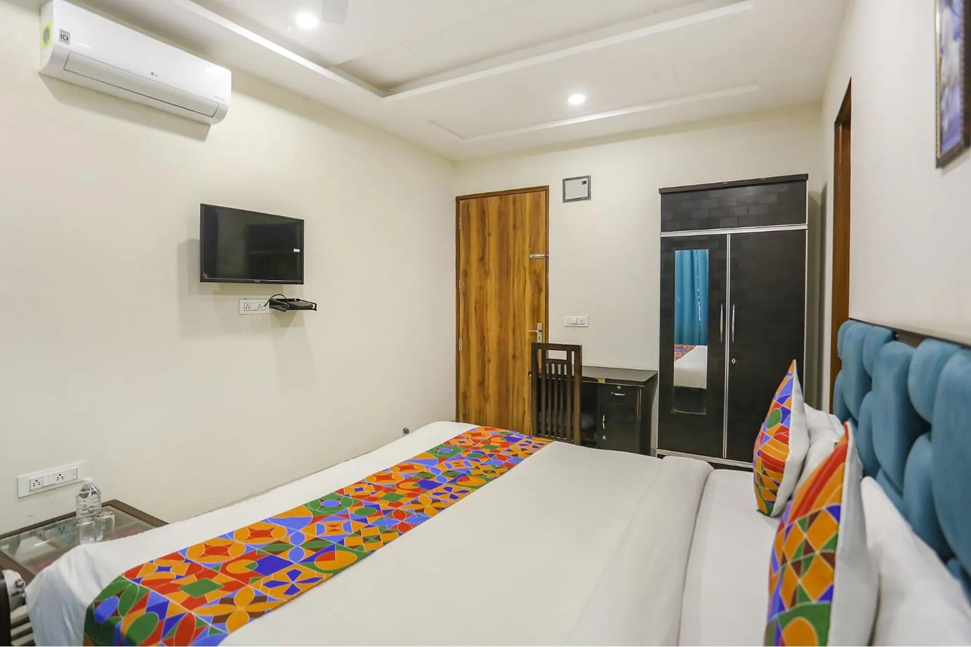 Bed in FabHotel Shiv Rachna - Mansarovar