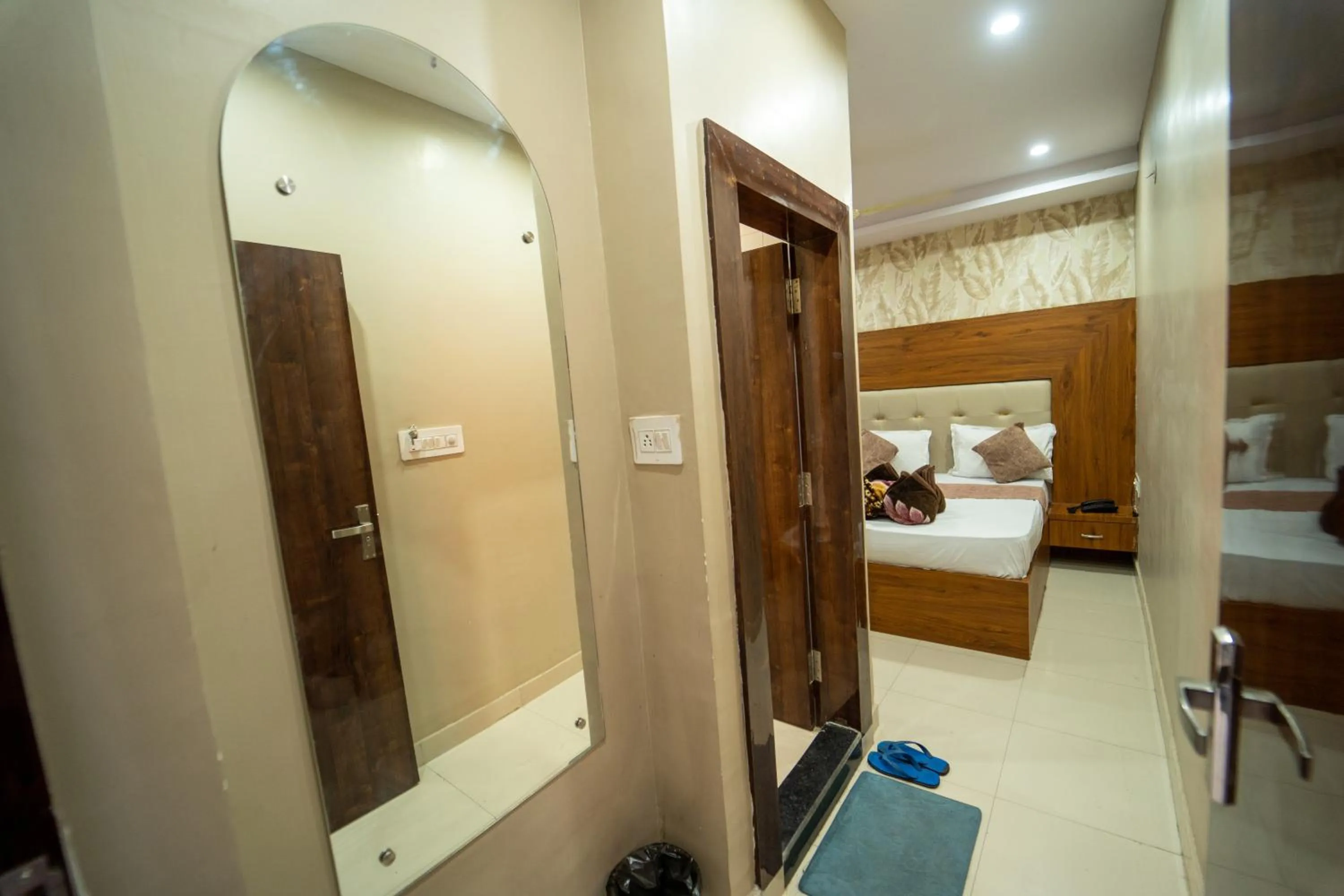 Bed in Hotel Siddhi Vinayak