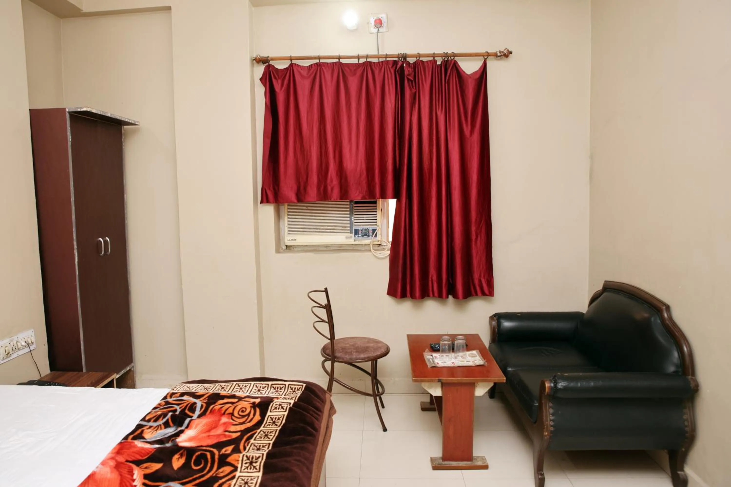 Bed in Hotel Siddhi Vinayak