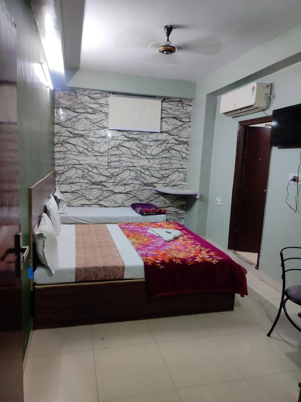 Bed in Hotel Siddhi Vinayak