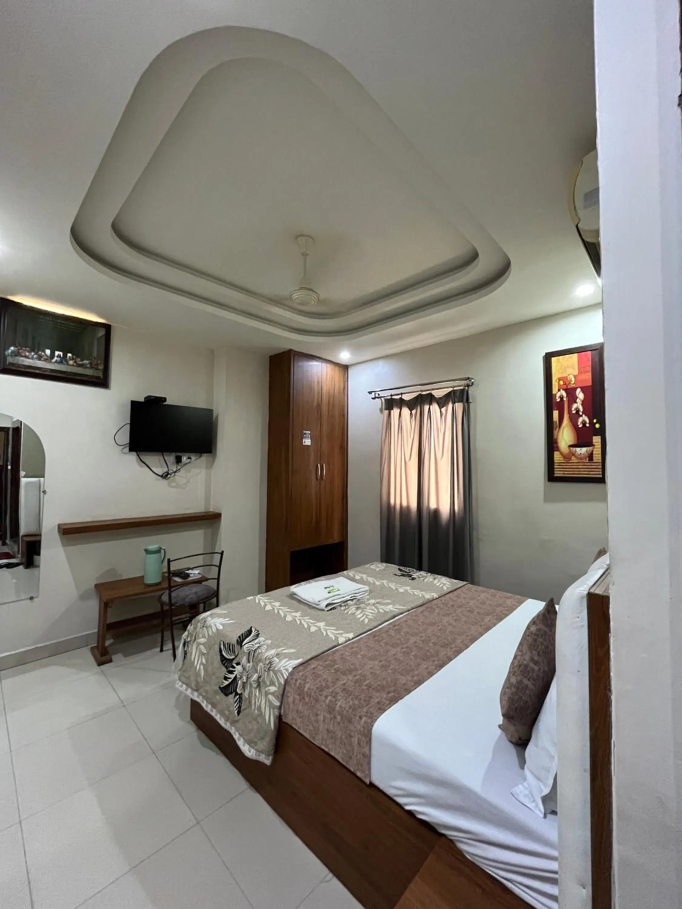 Bed in Hotel Siddhi Vinayak