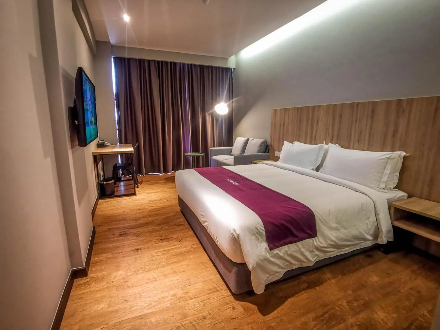 Photo of the whole room, Bed in Amigo Hotel Bintulu