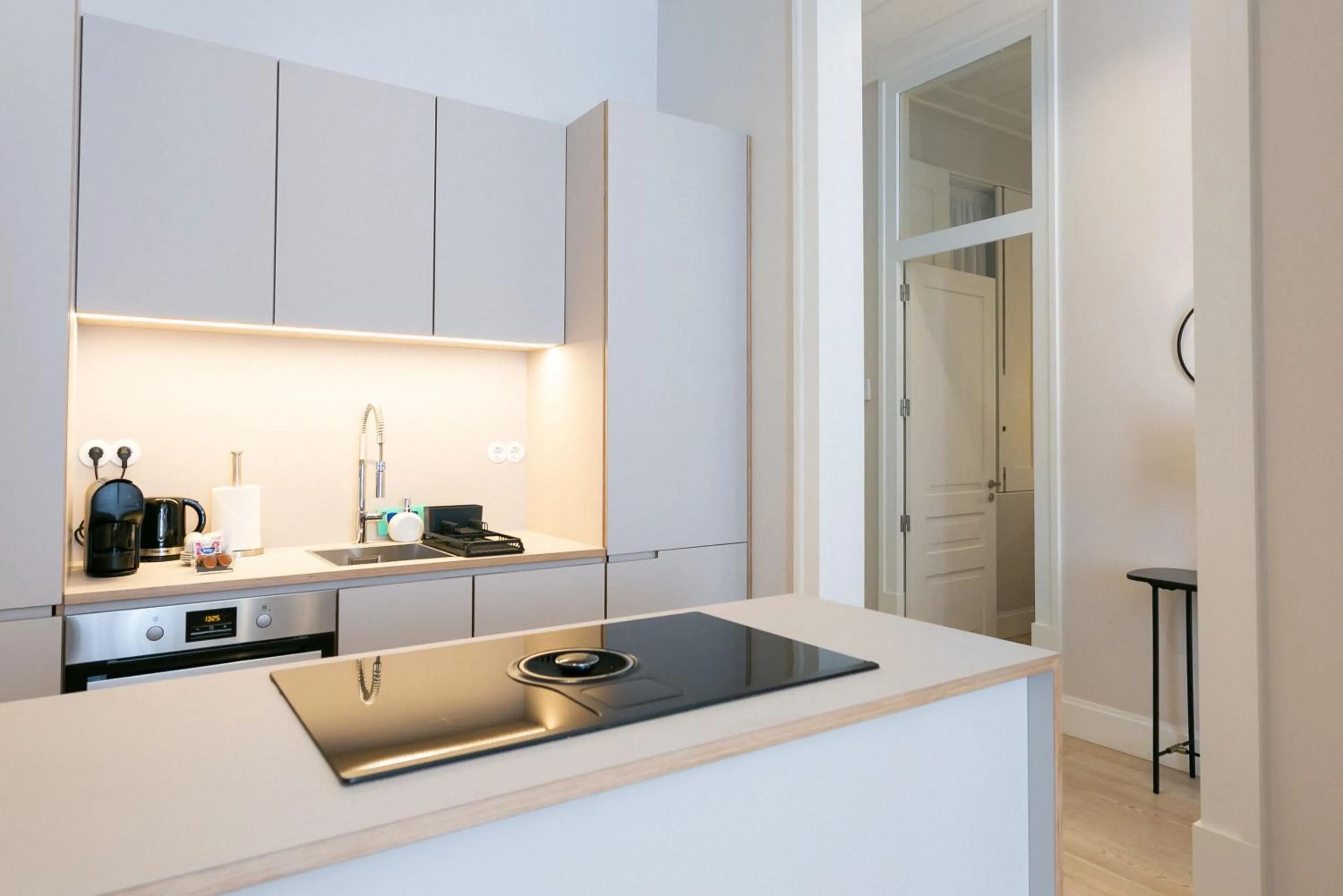 Kitchen or kitchenette in The Lift Apartments by RIDAN Hotels