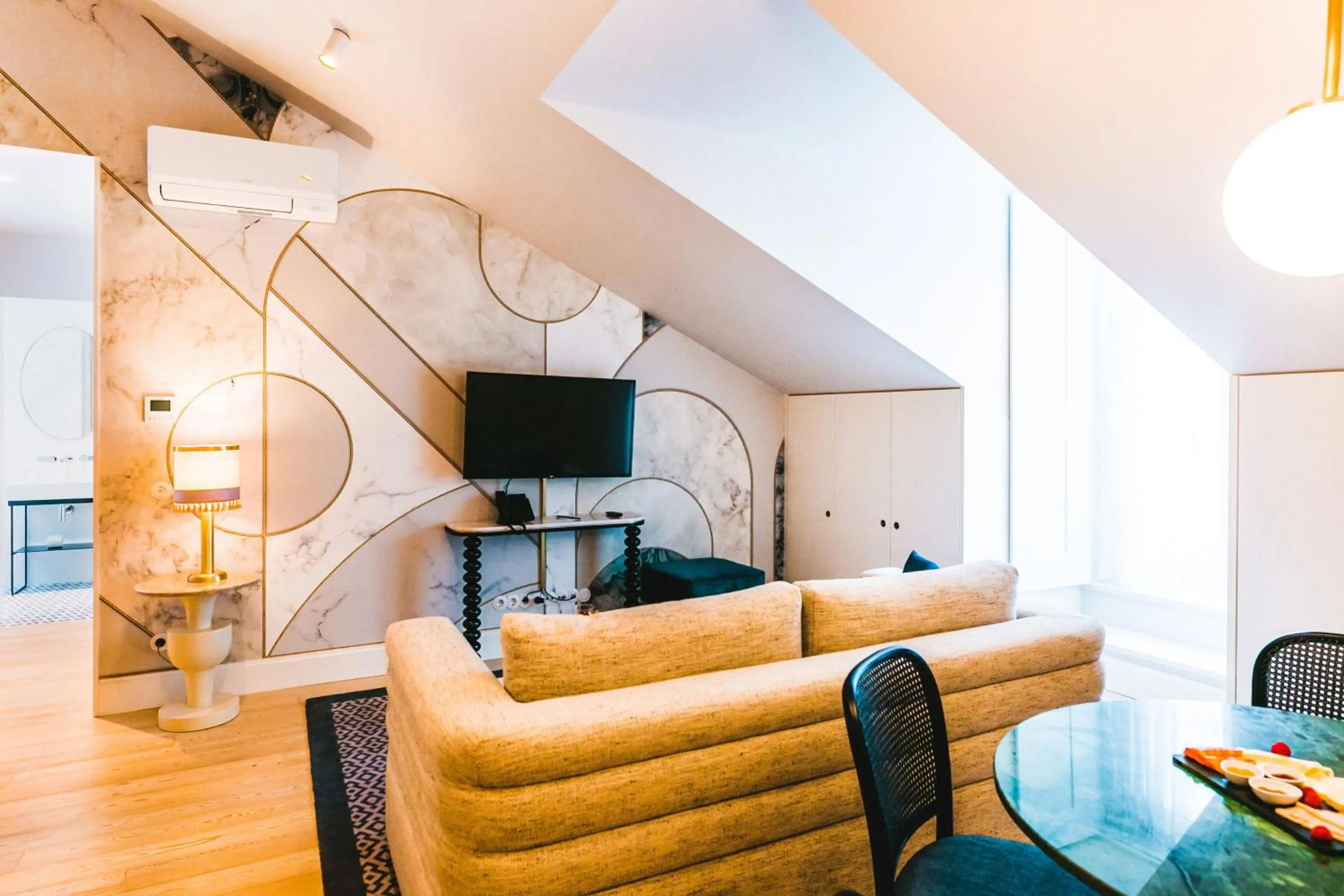 Communal lounge/ TV room in The Lift Apartments by RIDAN Hotels