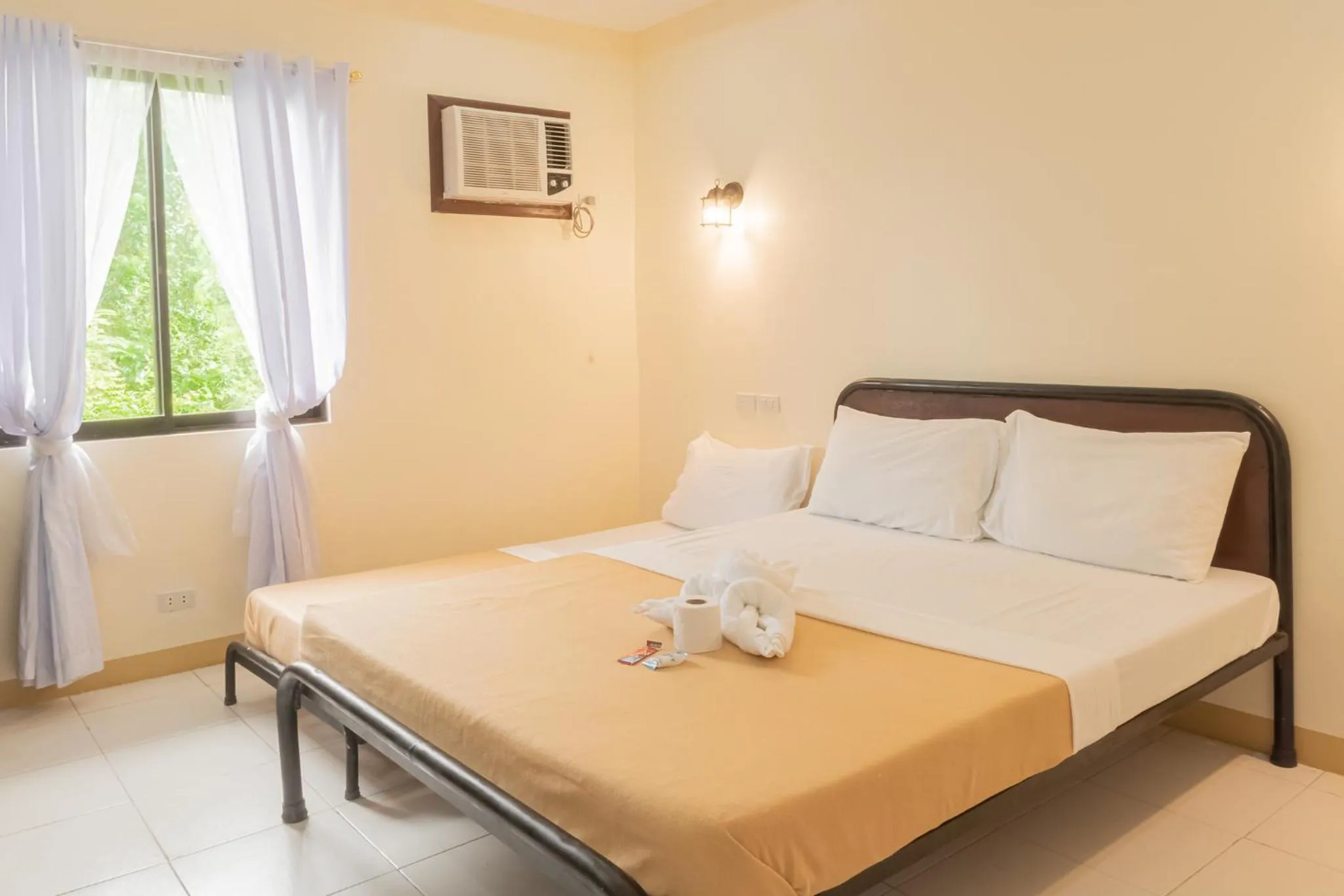 Bed in Almira Diving Resort- Panglao