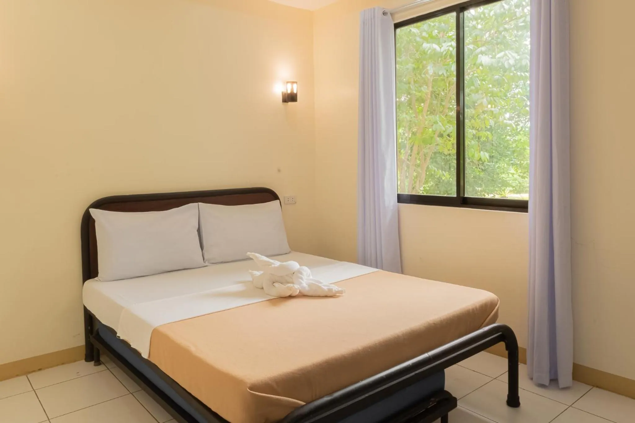 Bed in Almira Diving Resort- Panglao