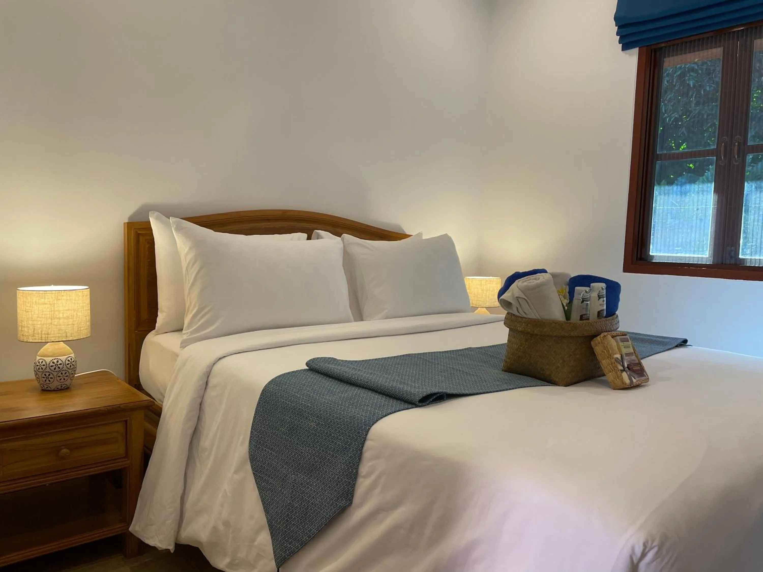 Bed in The Pace Phuket Boutique Resort