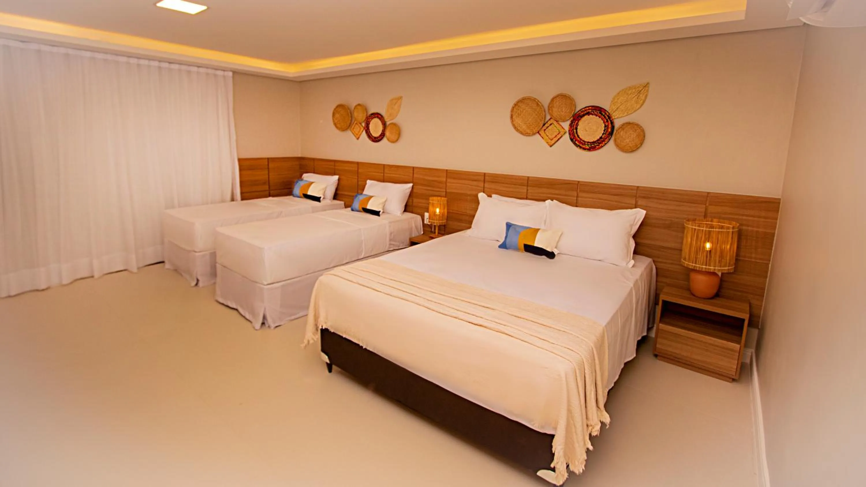 Bed in Paraiso Beach Hotel