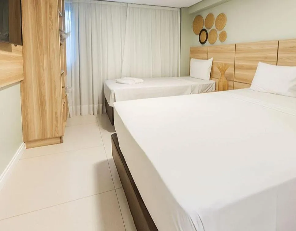 Bed in Paraiso Beach Hotel