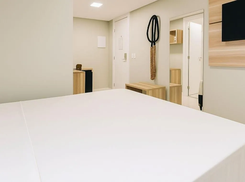 Bed in Paraiso Beach Hotel