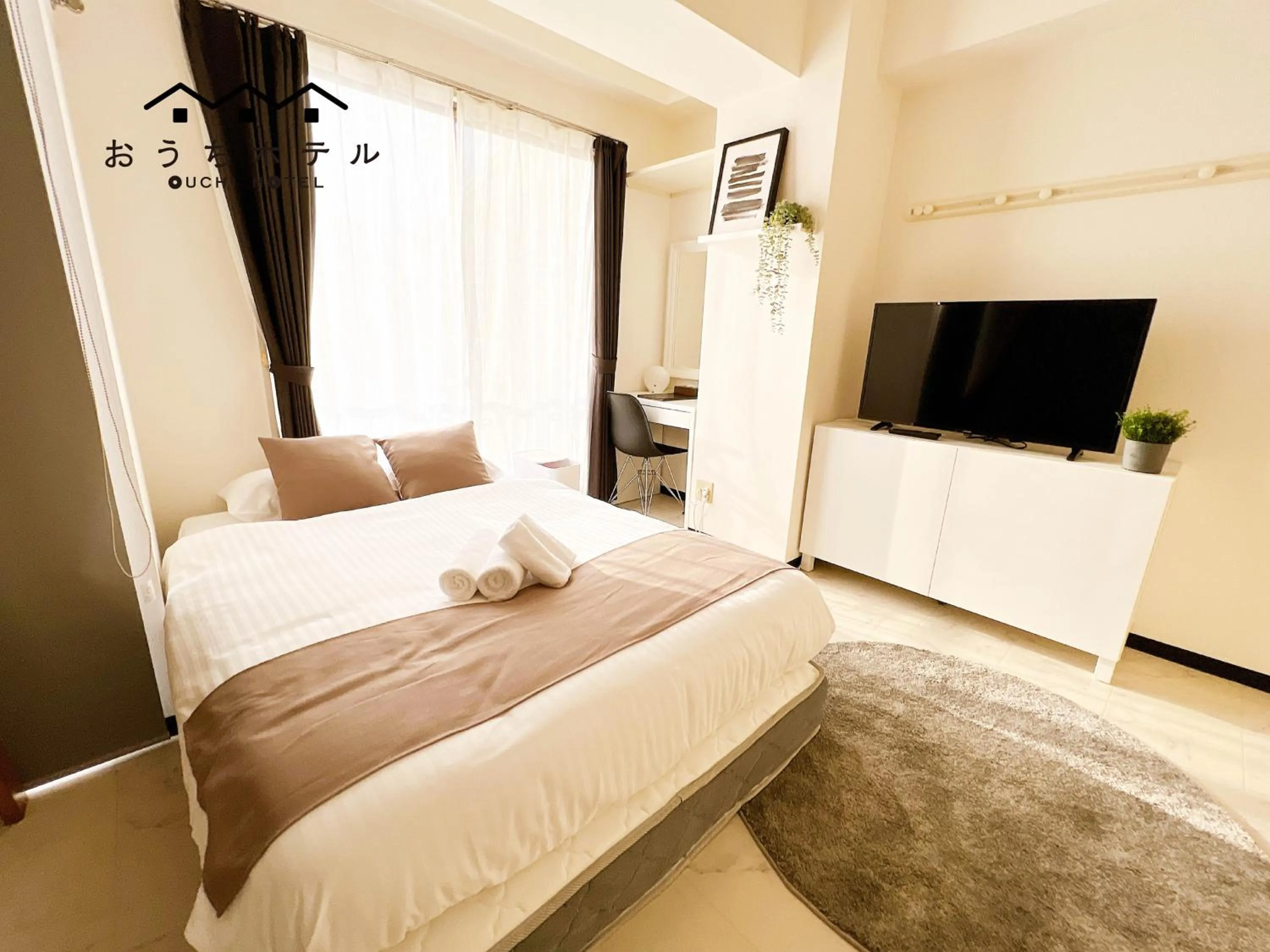 Bed in OUCHI HOTEL Fujimi