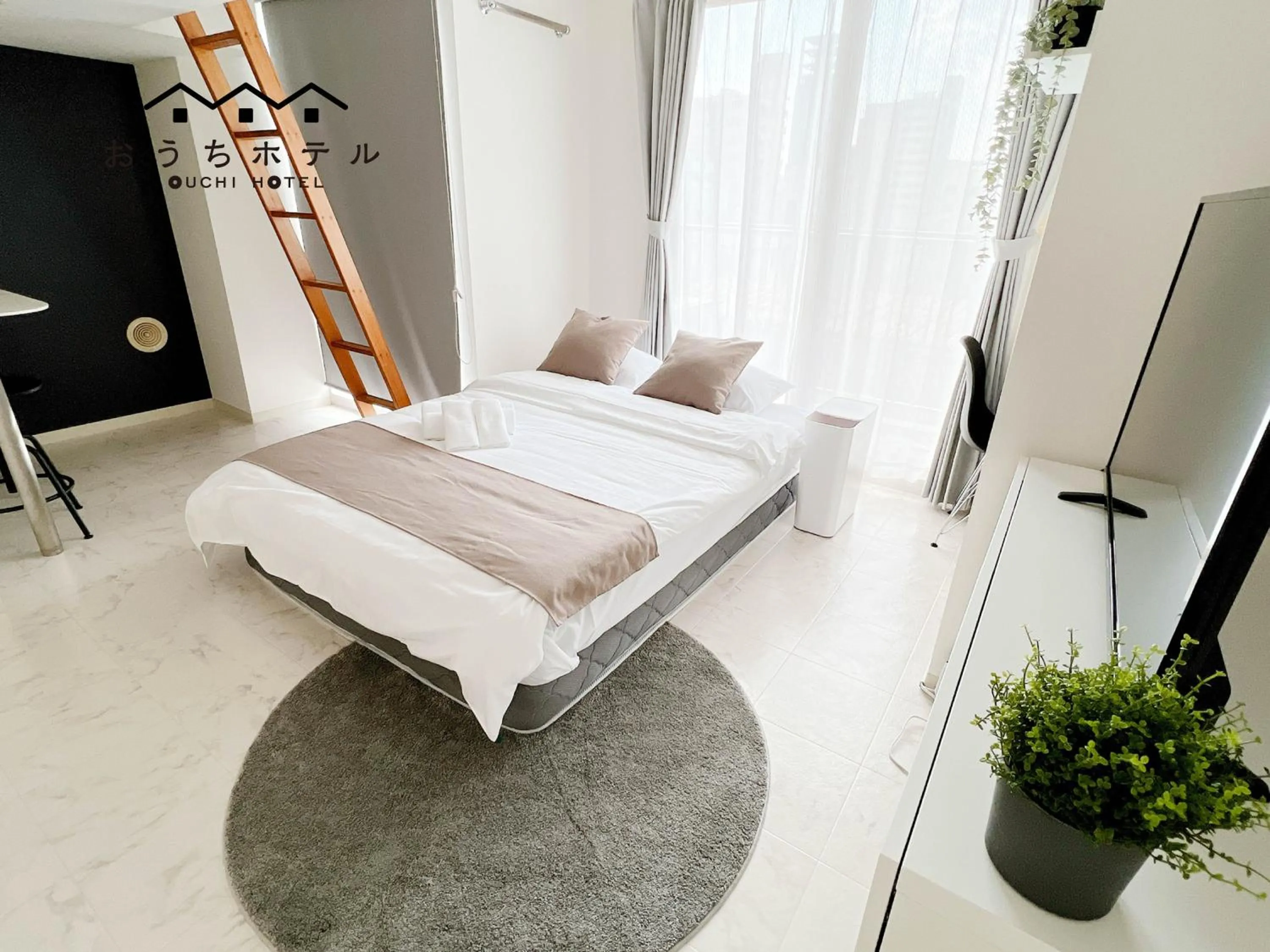 Bed in OUCHI HOTEL Fujimi