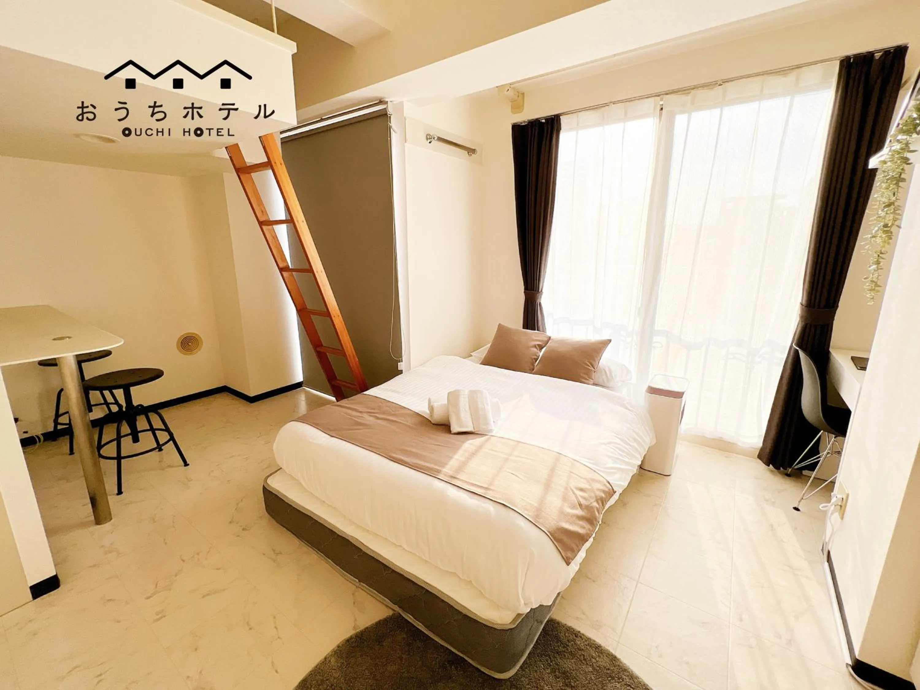 Bed in OUCHI HOTEL Fujimi