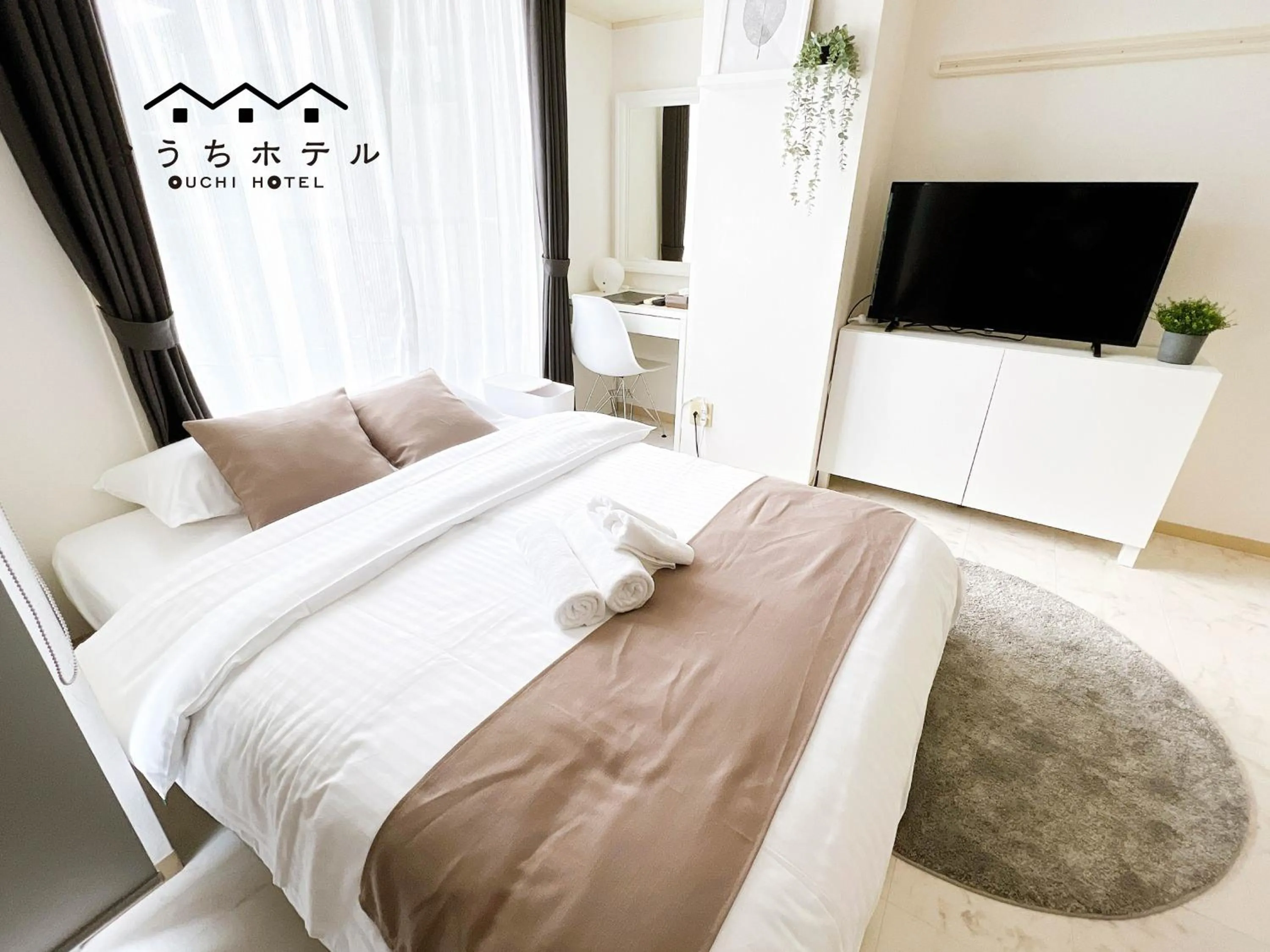 Bed in OUCHI HOTEL Fujimi