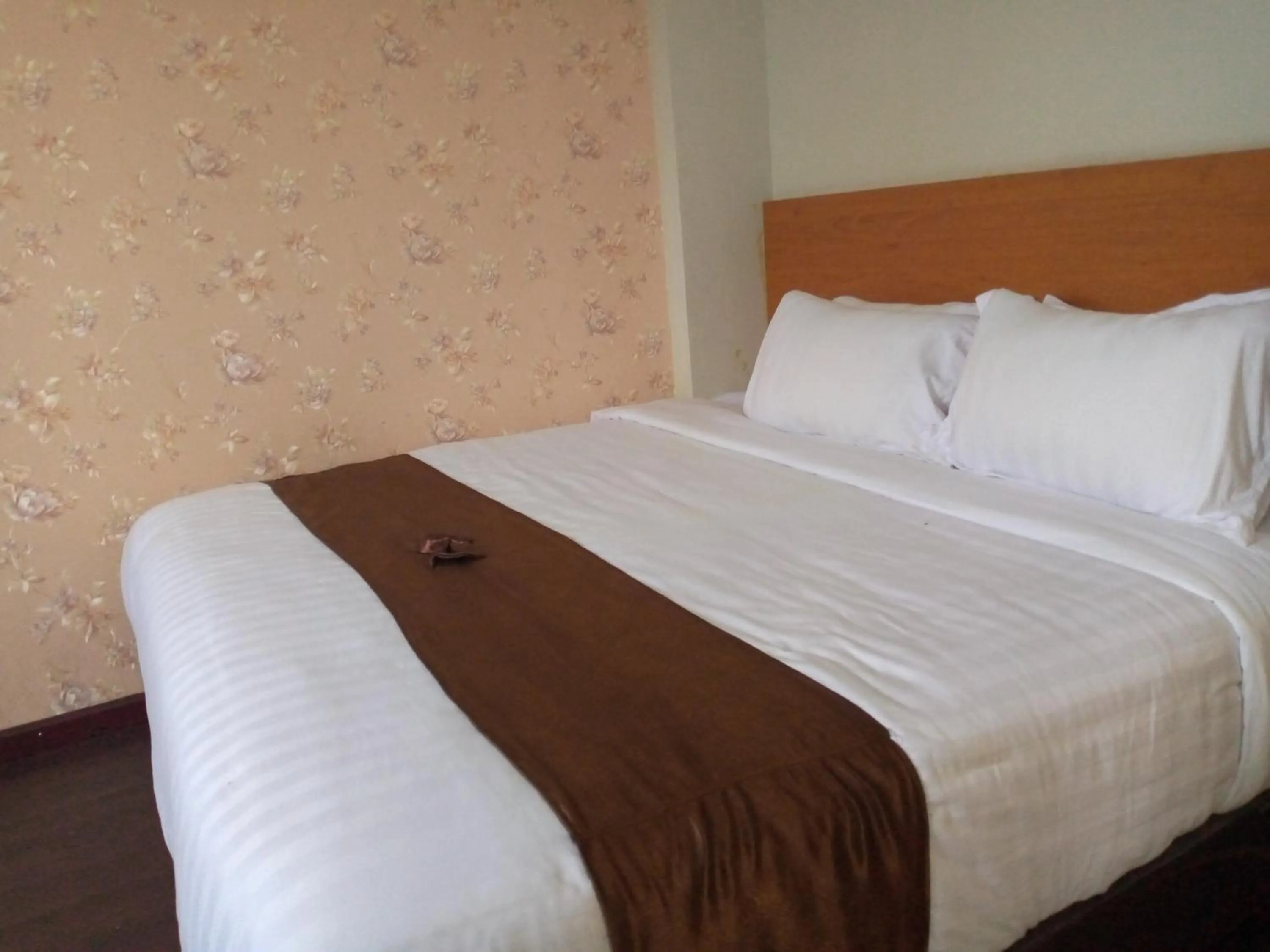 Bed in Hotel Belangi Syariah Taakengon Mitra RedDoorz