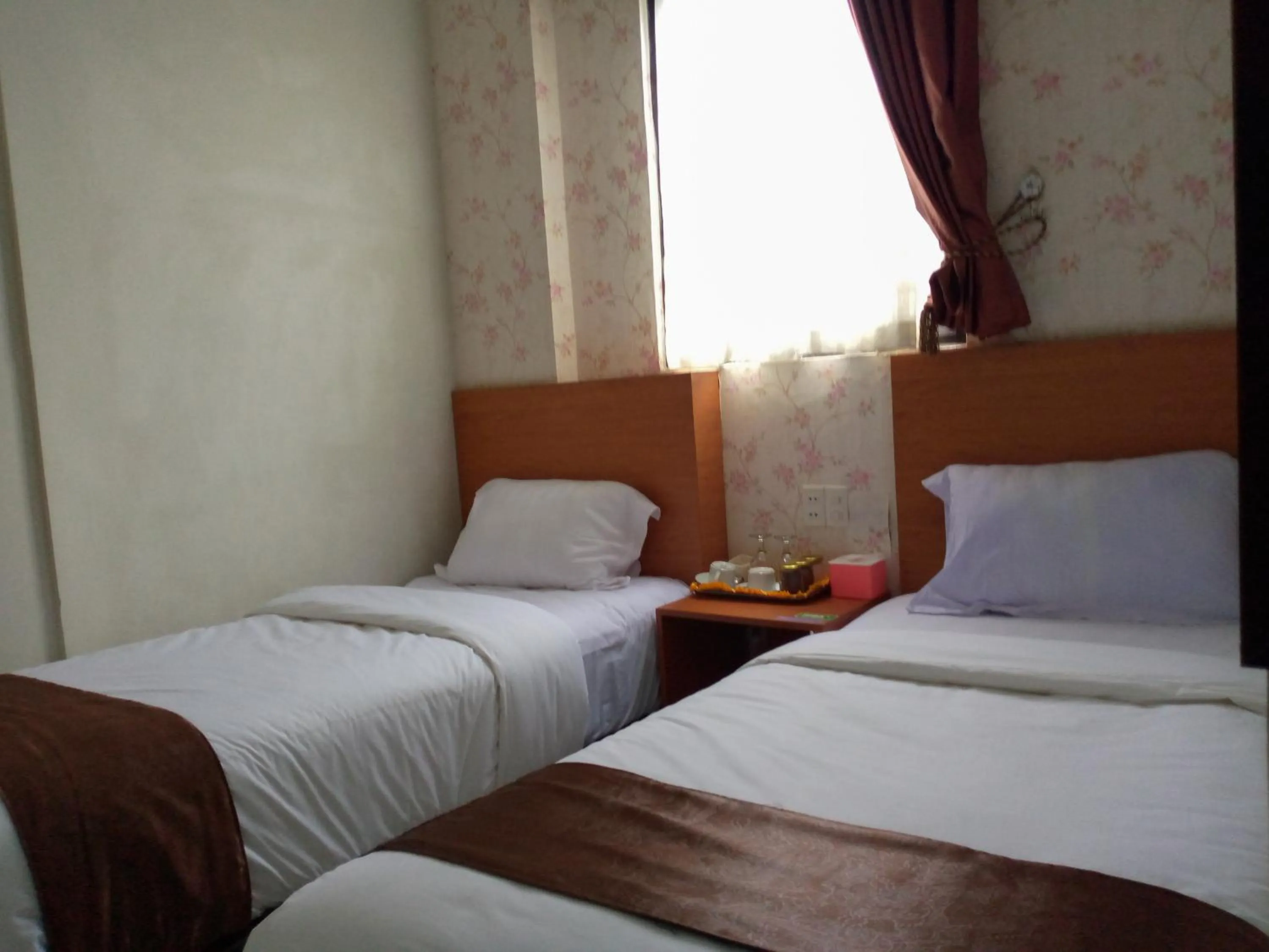 Bed in Hotel Belangi Syariah Taakengon Mitra RedDoorz