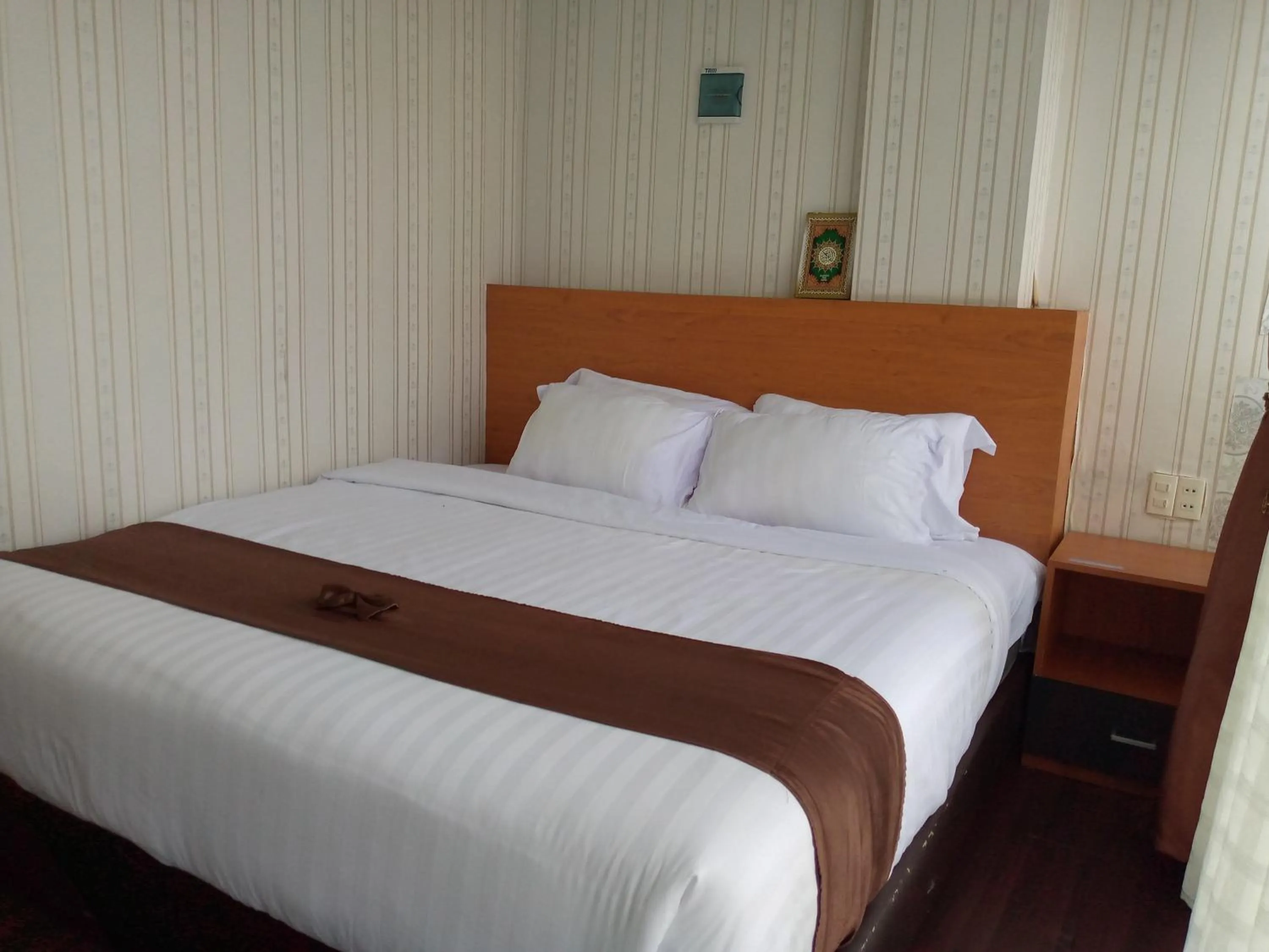 Bed in Hotel Belangi Syariah Taakengon Mitra RedDoorz