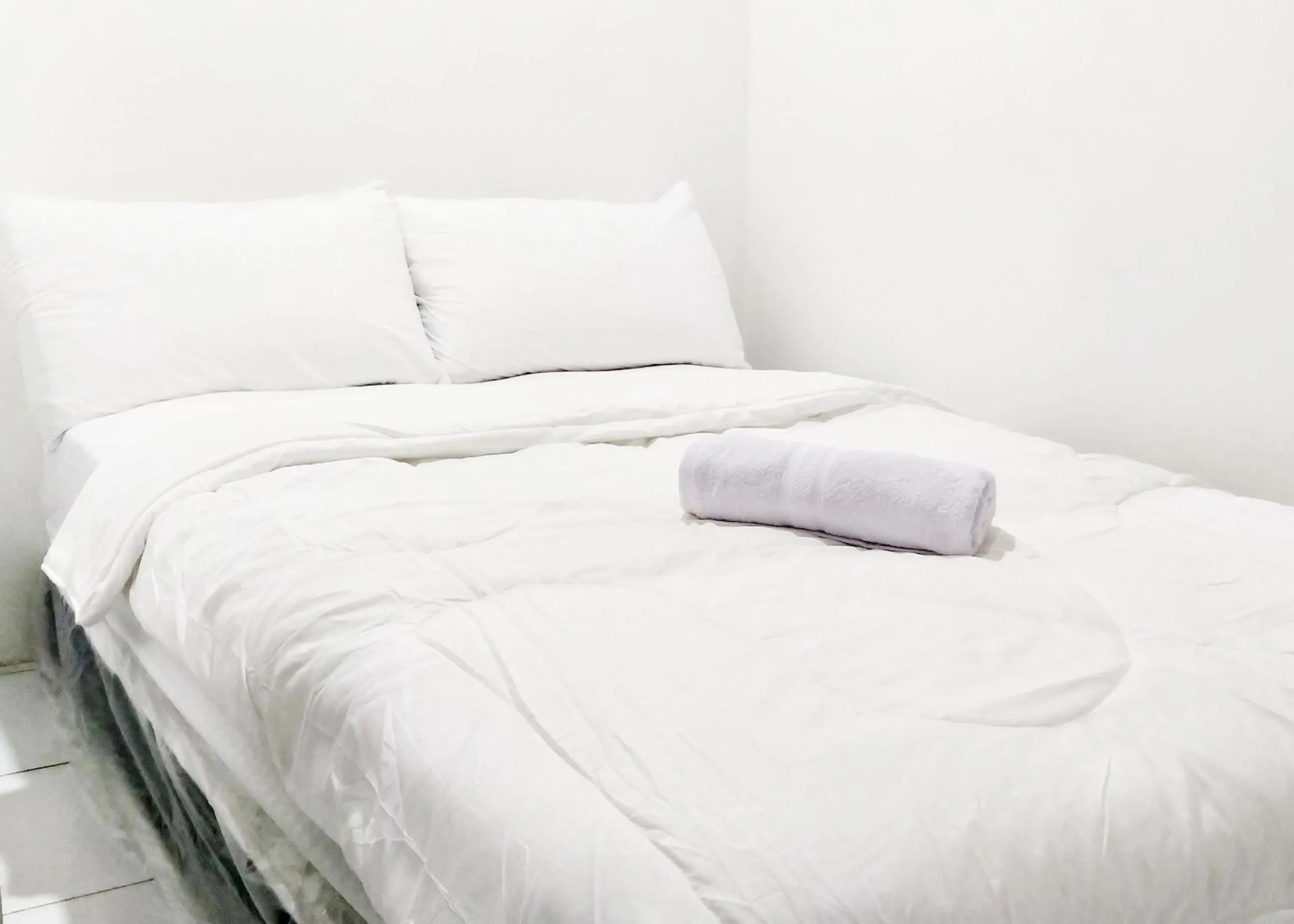 Bed in Guest House Kembar Syariah Semarang RedPartner