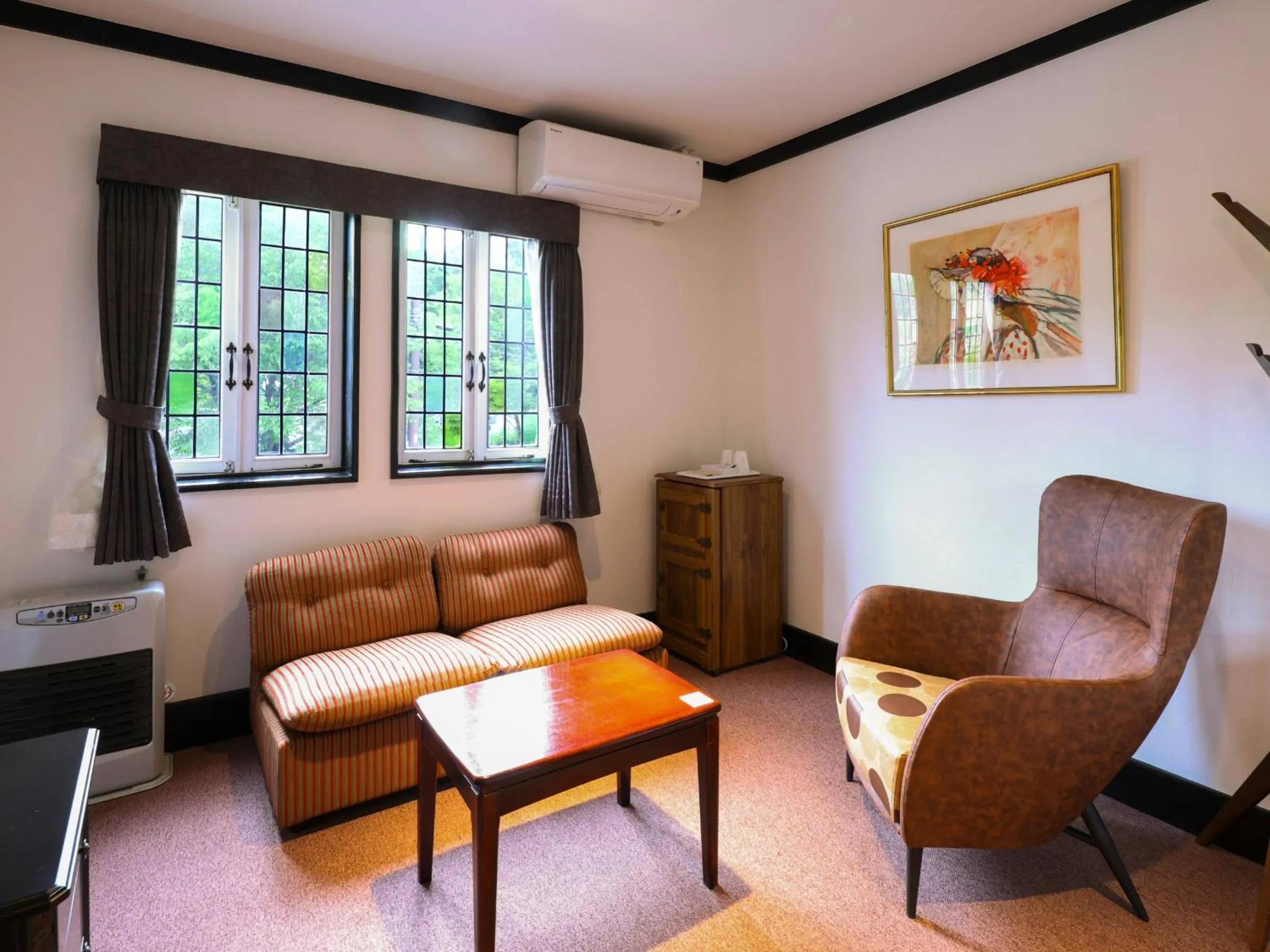 Living room in Petit Hotel & Restaurant Old Age