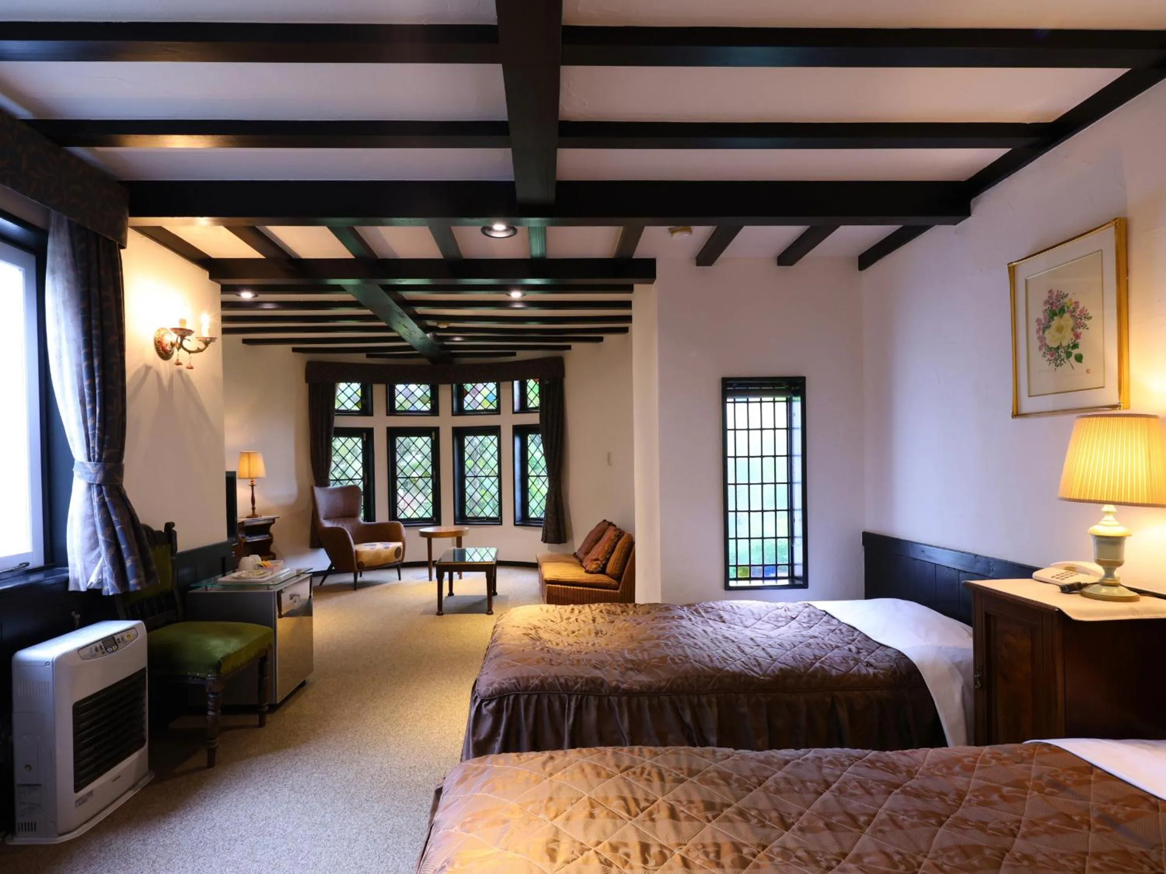 Bed in Petit Hotel & Restaurant Old Age