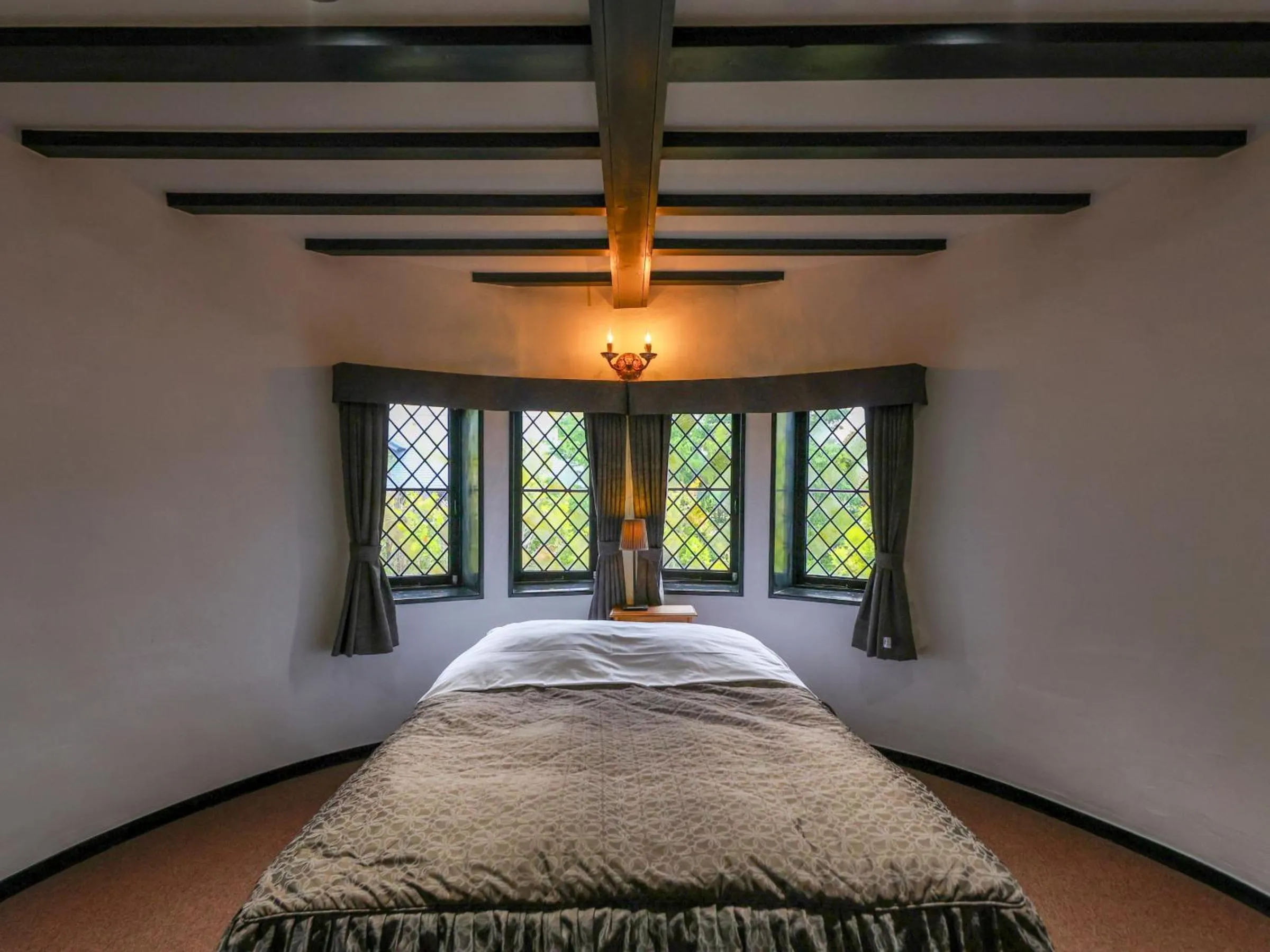 Bed in Petit Hotel & Restaurant Old Age