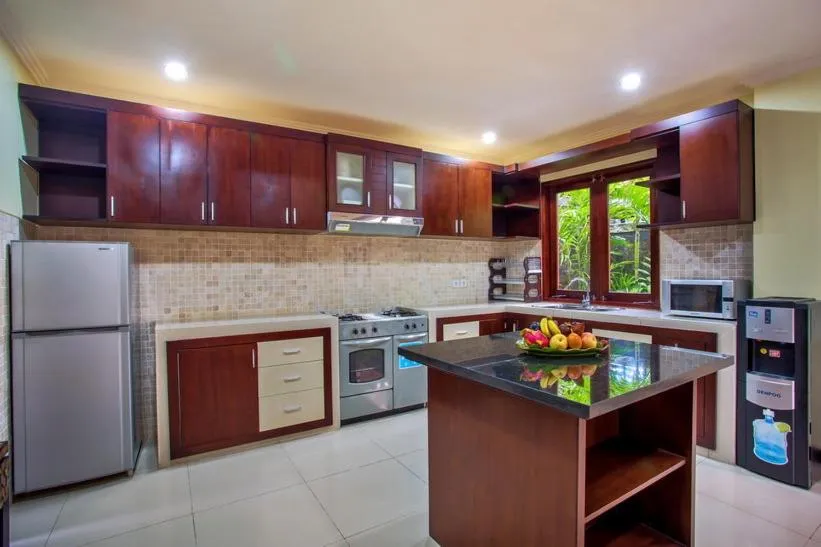 Kitchen or kitchenette in Tiga Samudra Villa