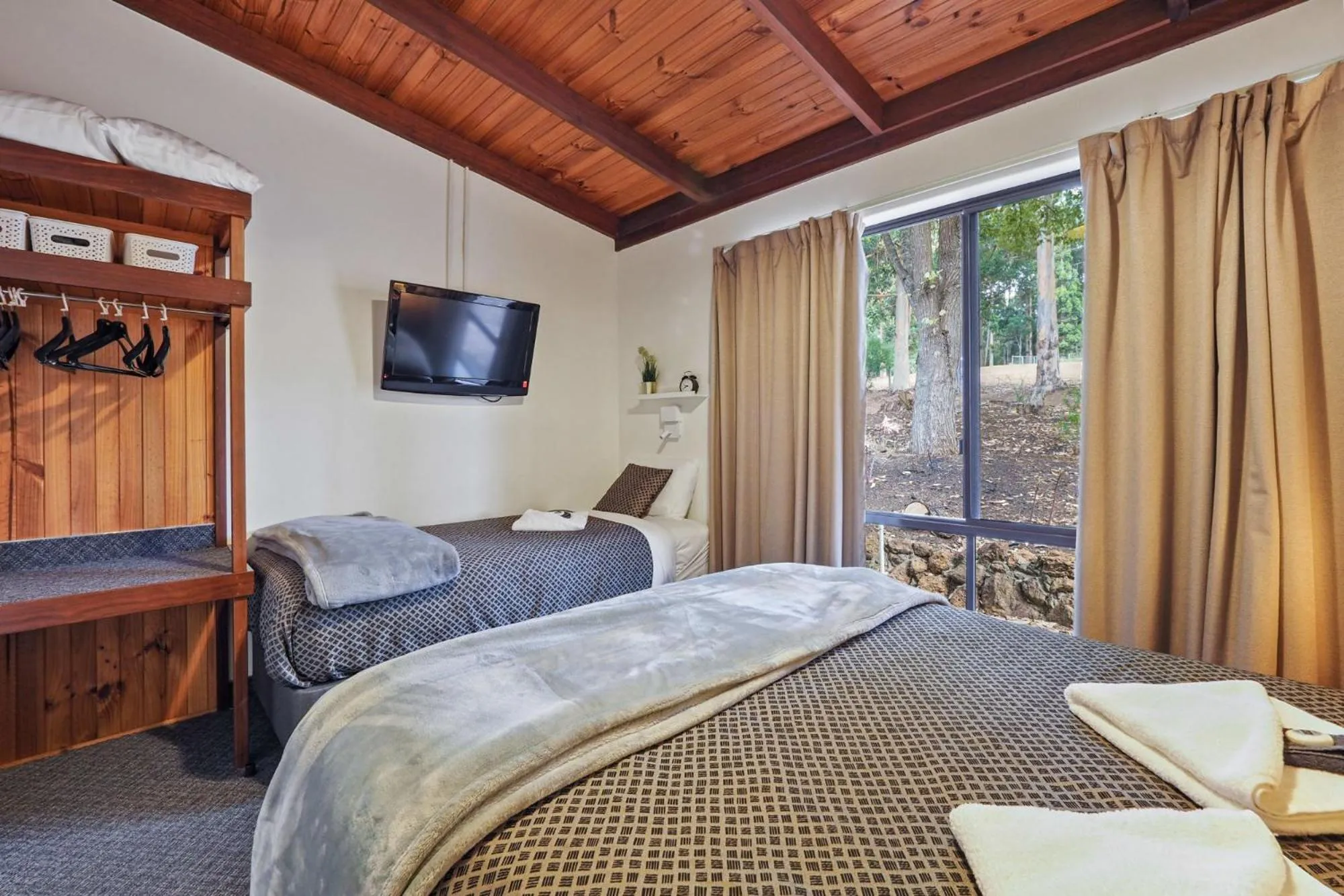 Bed in Forest Lodge Resort