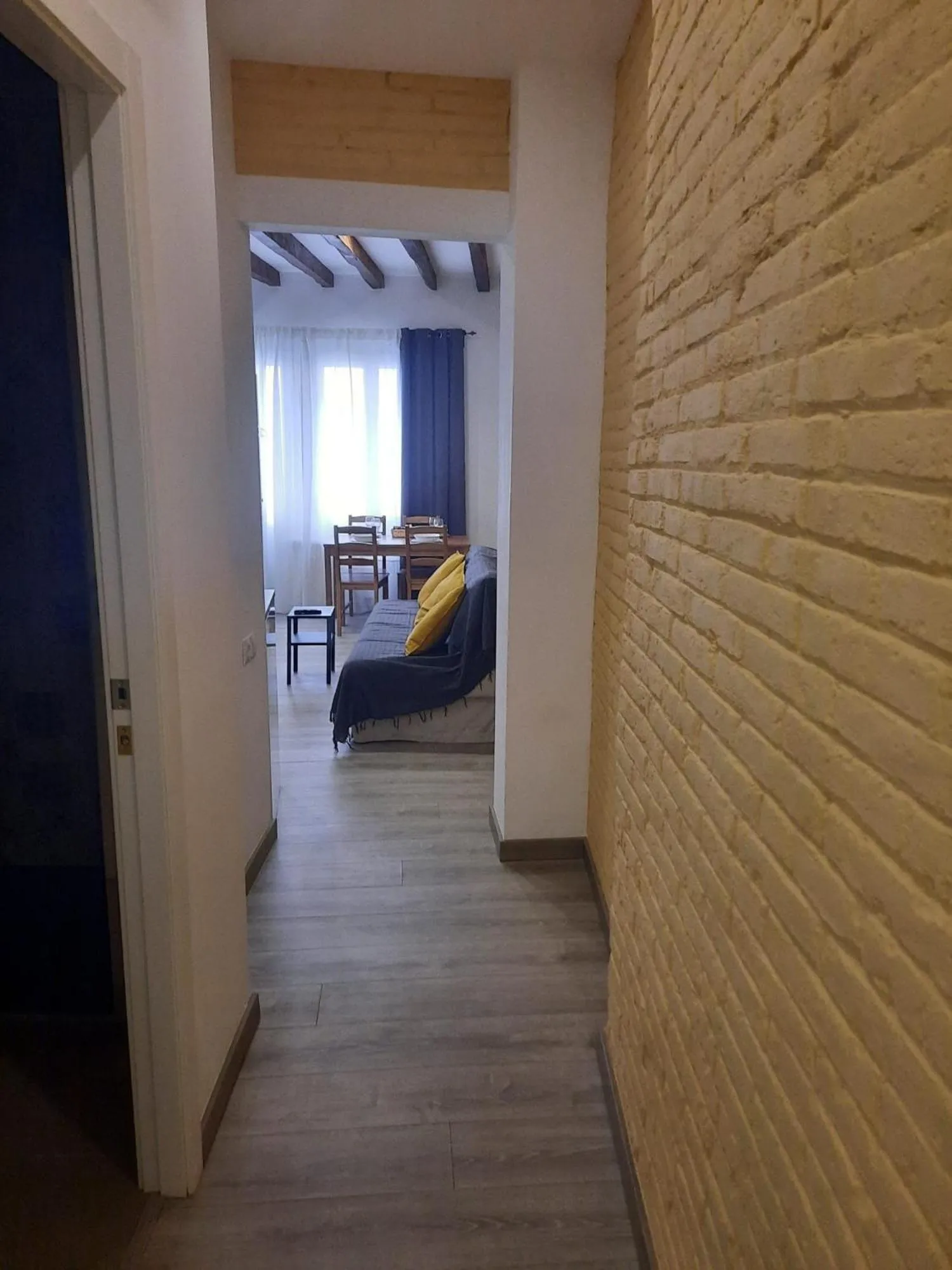 Living room, Bed in Apartaco Apartamentos