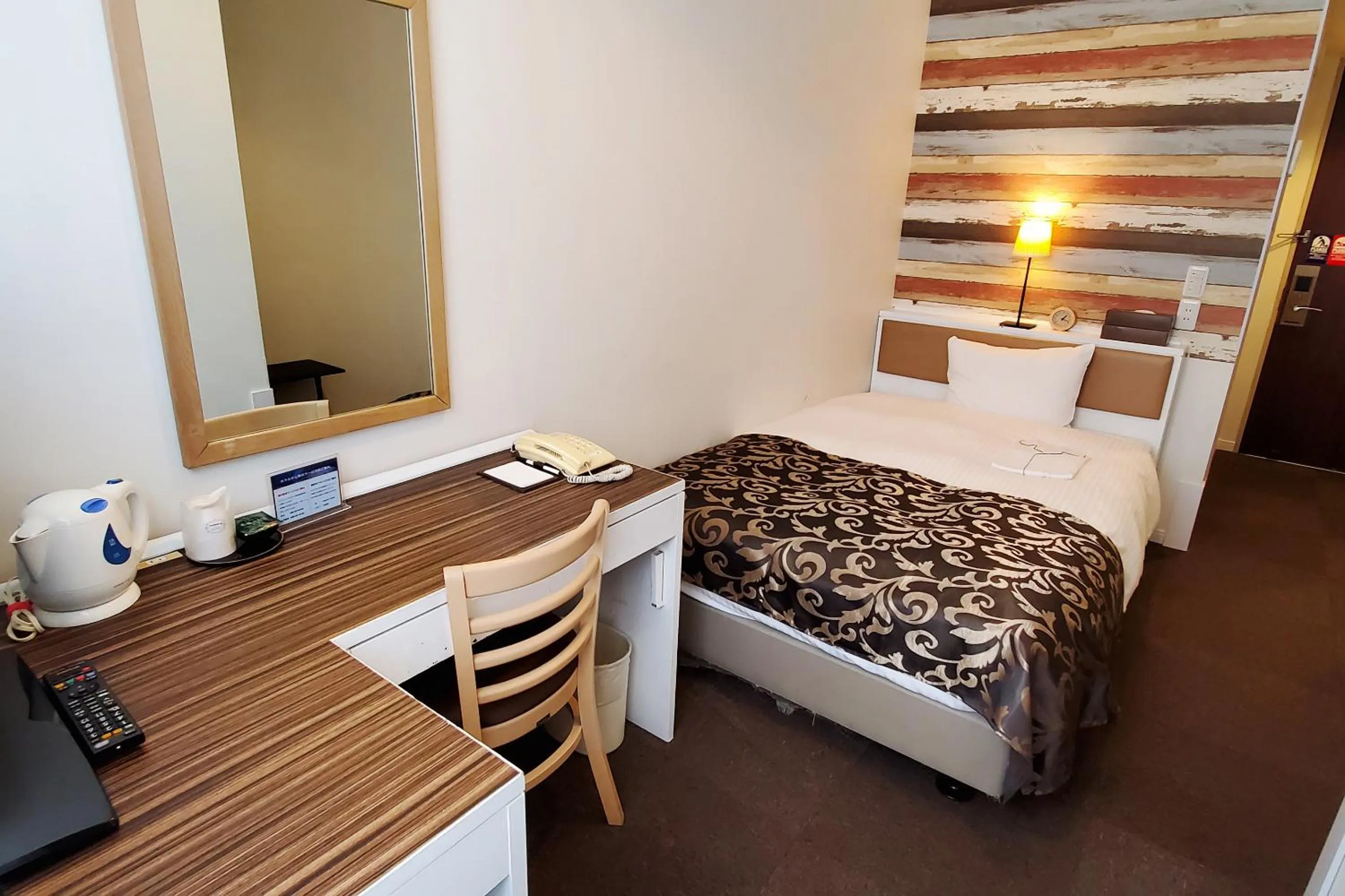 Photo of the whole room, Bed in Tachikawa Regent Hotel