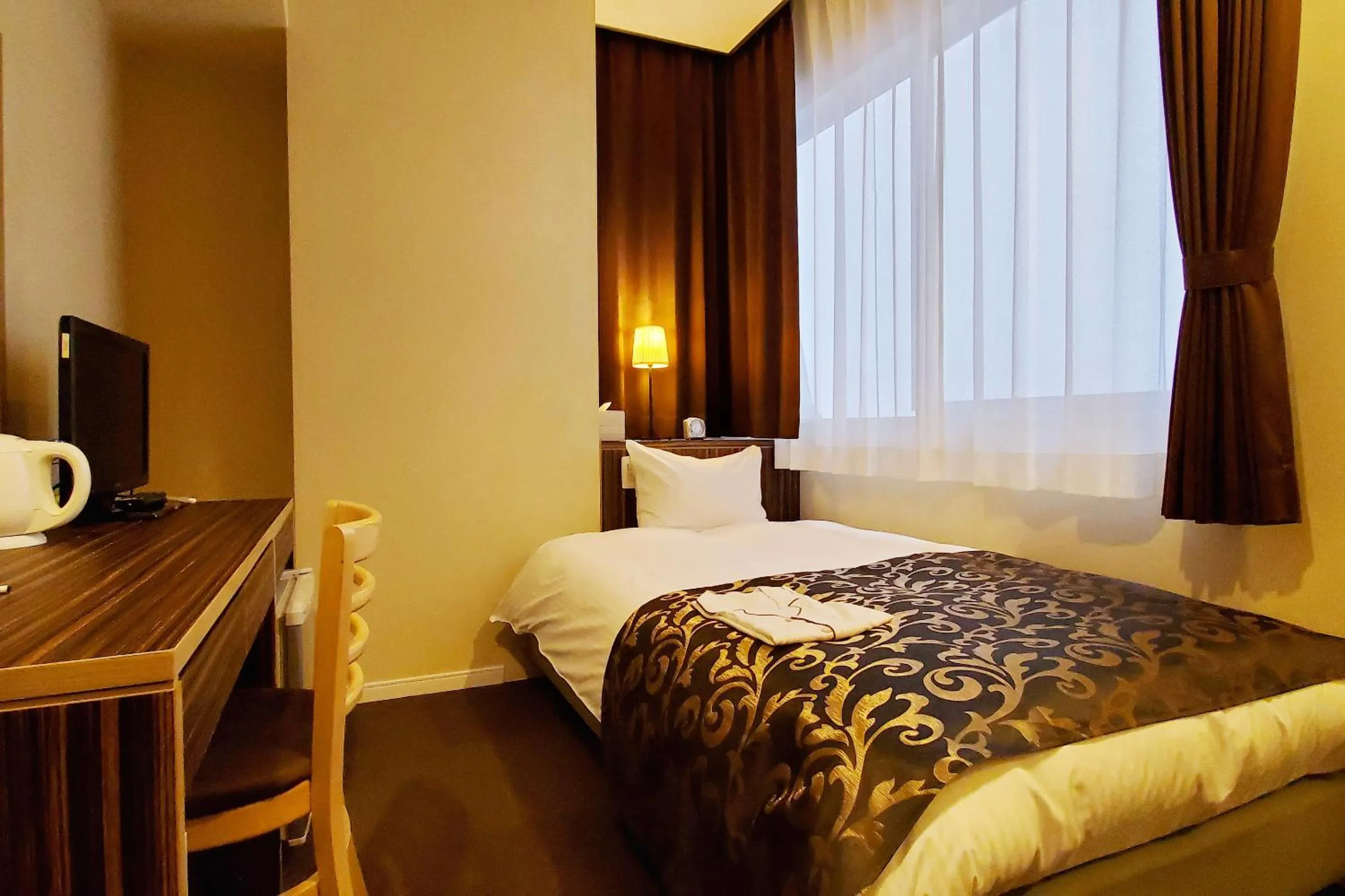 Bedroom, Bed in Tachikawa Regent Hotel