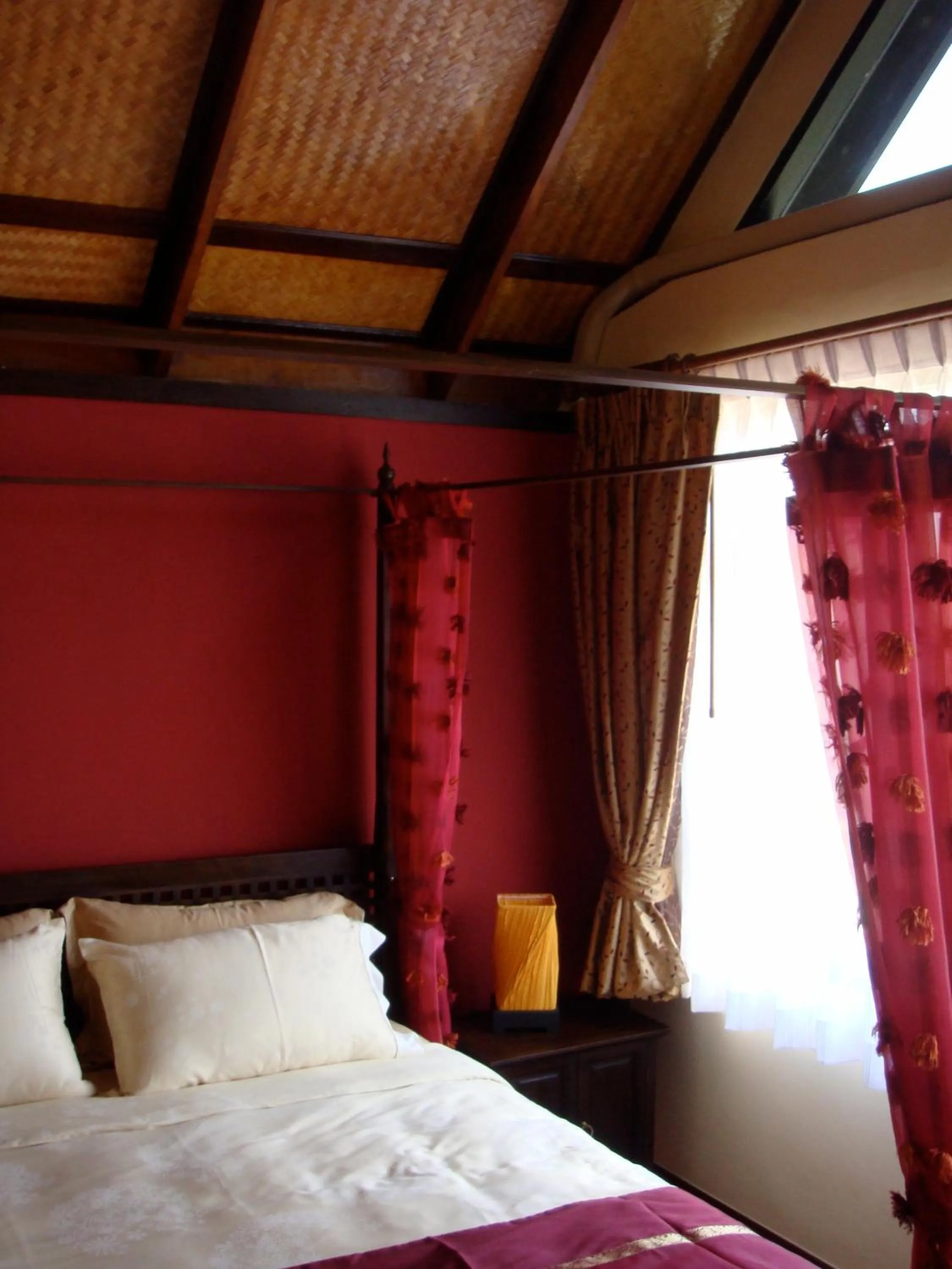 Bed in Sunset Apartment Phuket