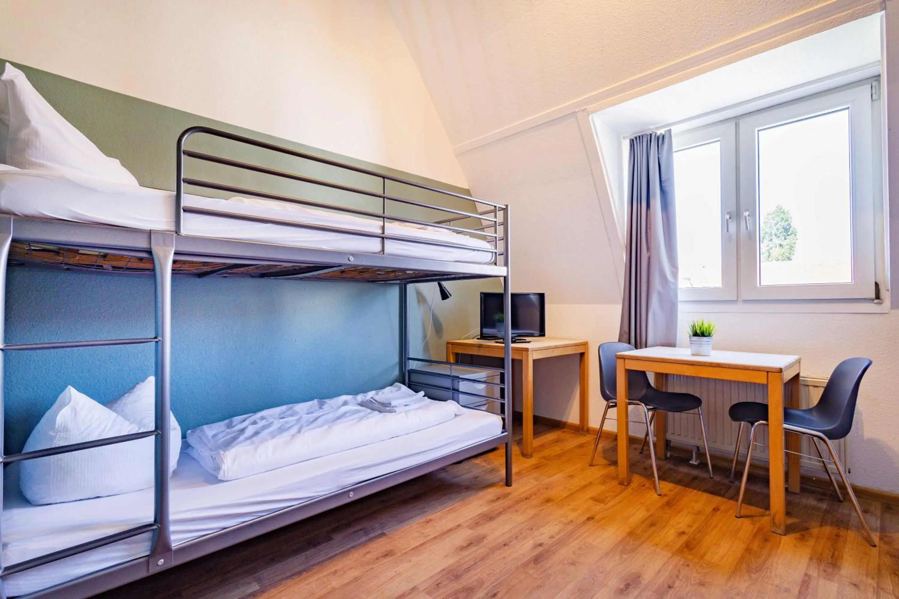TV and multimedia, Bed in StayInn Hostel und Gästehaus